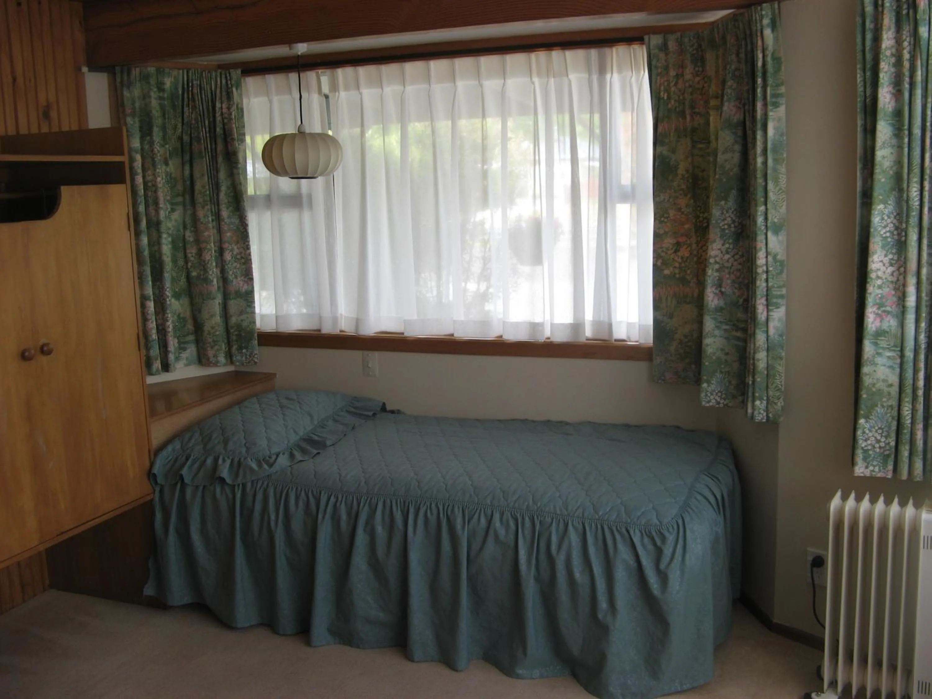 Bed in Tongariro River Motel