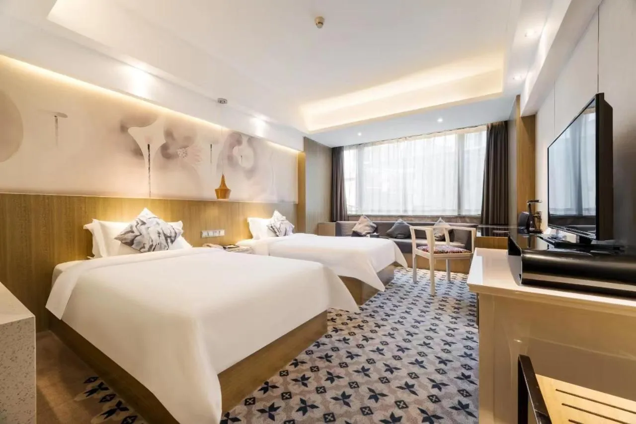 Bed in Paco Hotel Tianpingjia Metro Guangzhou