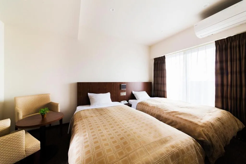 Bed in Kansai Airport First Hotel