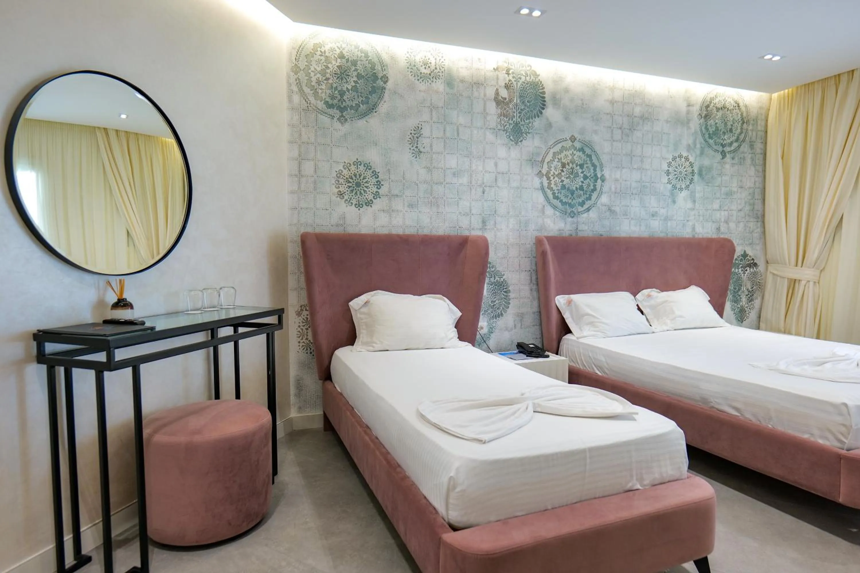 Bed in HH Boutique Hotel