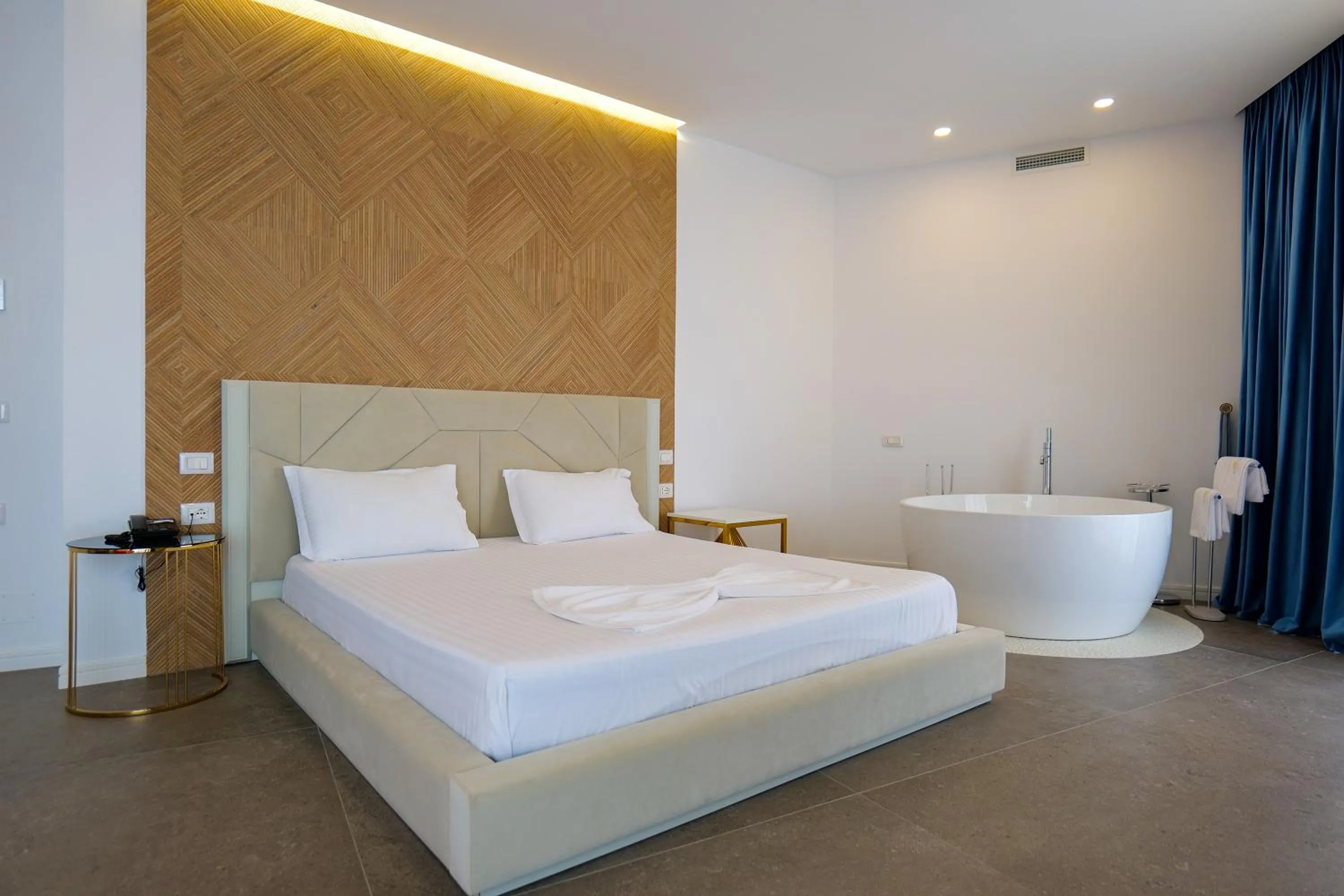 Bed in HH Boutique Hotel
