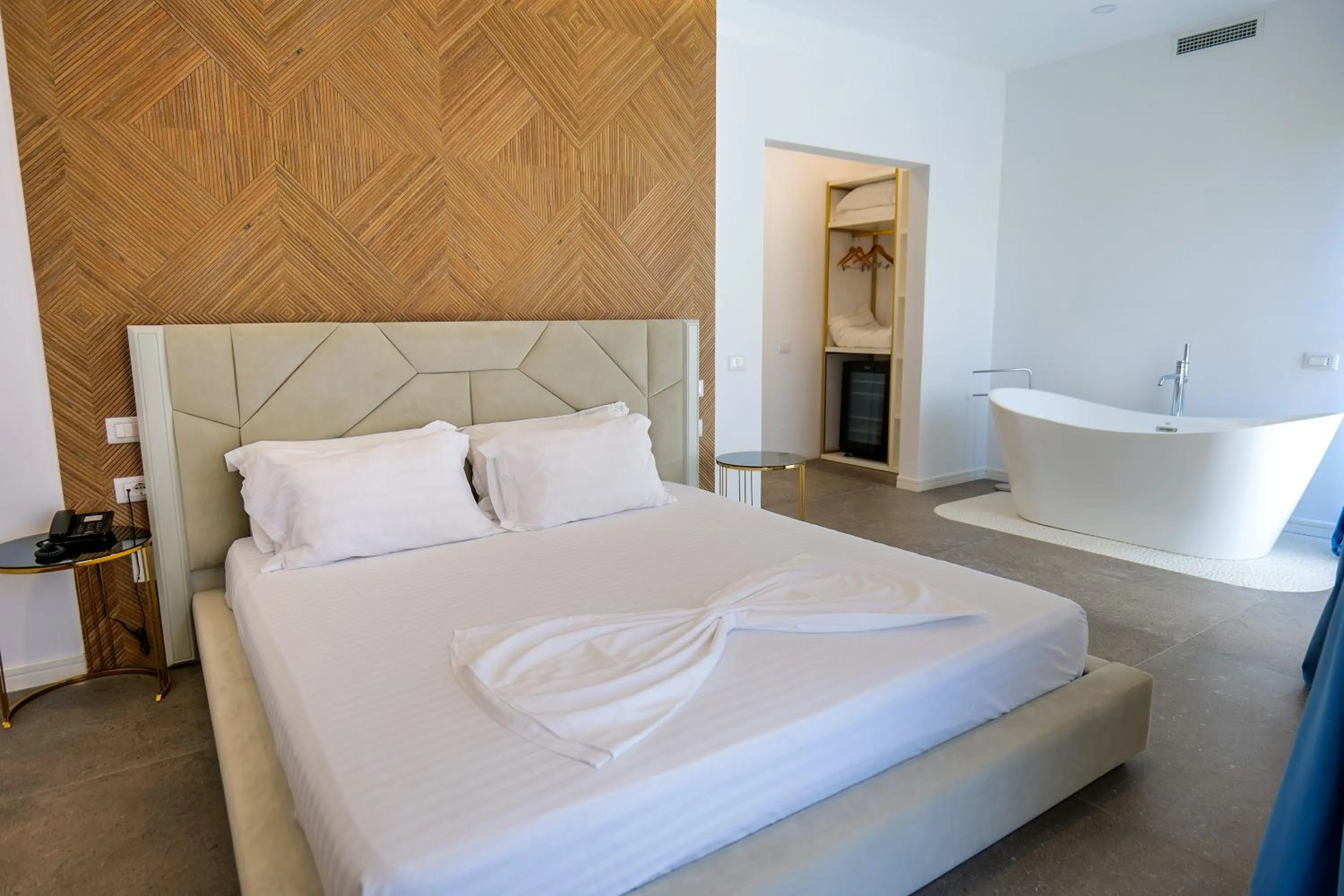 Bed in HH Boutique Hotel