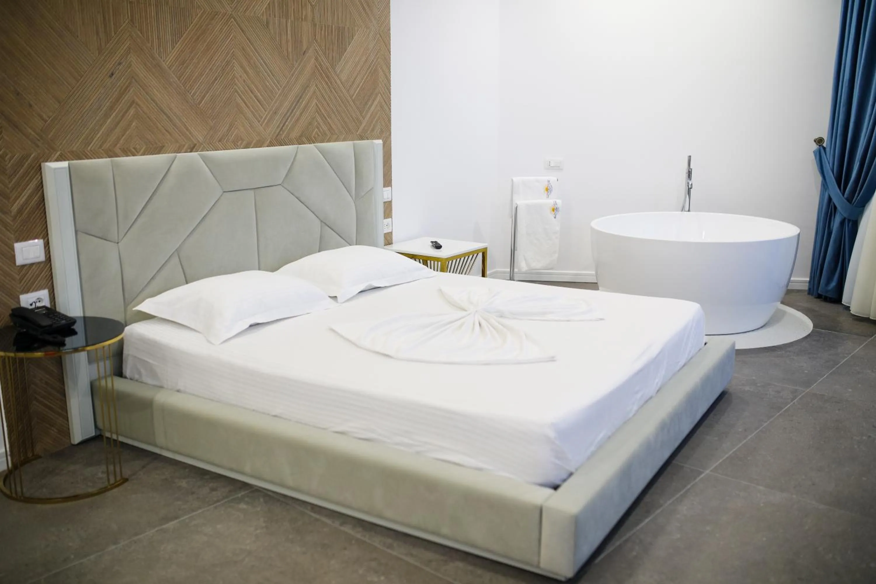 Bed in HH Boutique Hotel