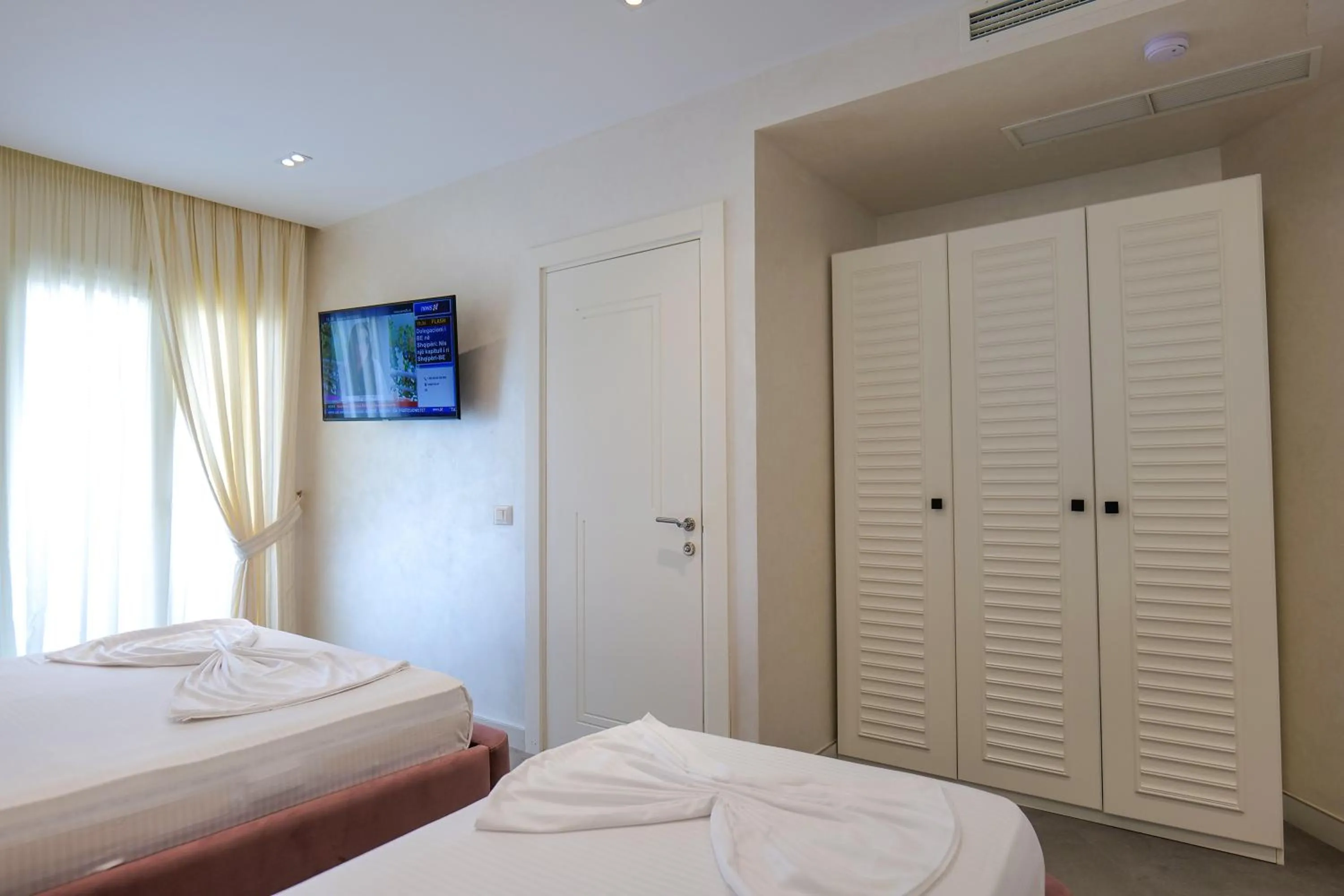 Bed in HH Boutique Hotel