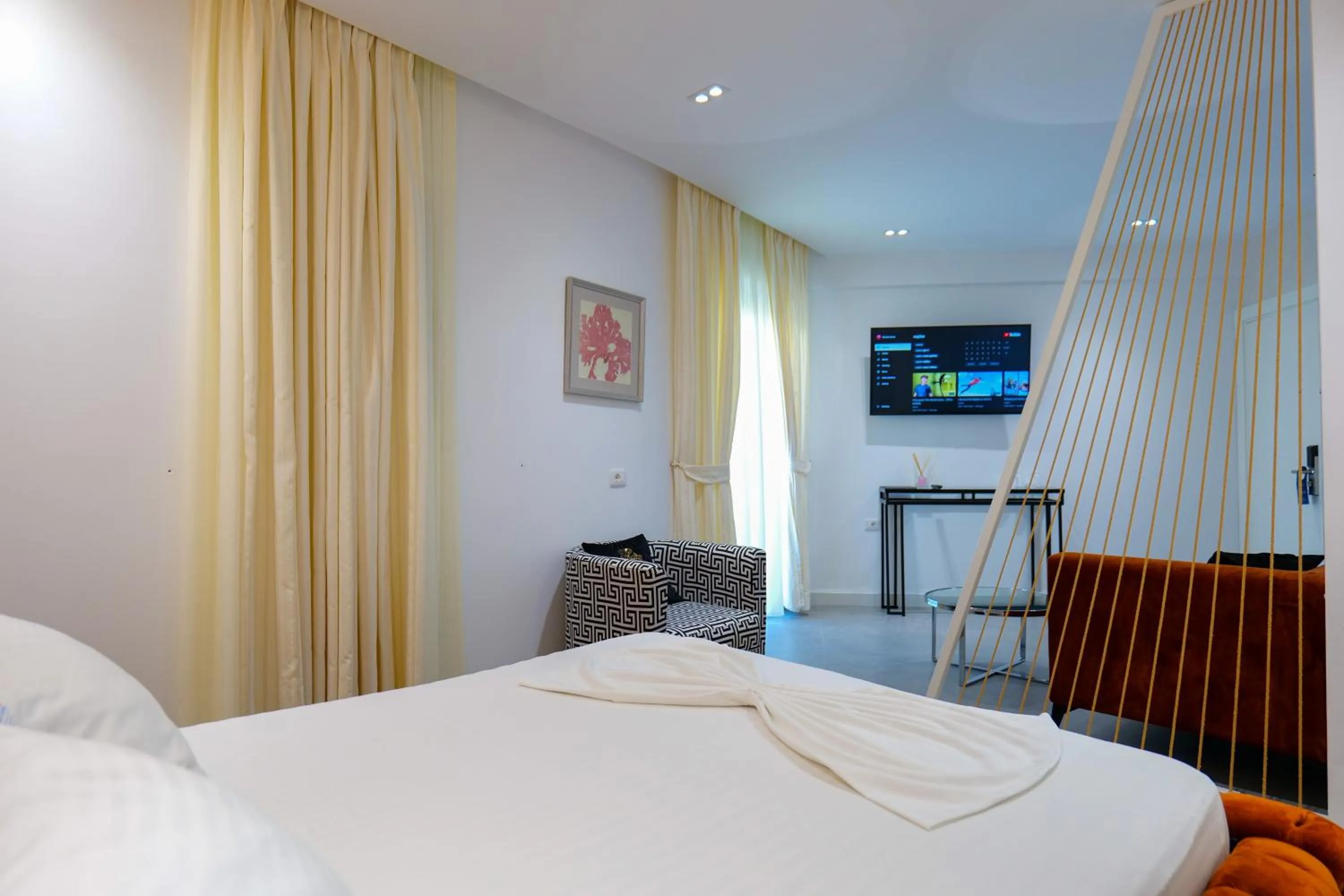 Bed in HH Boutique Hotel