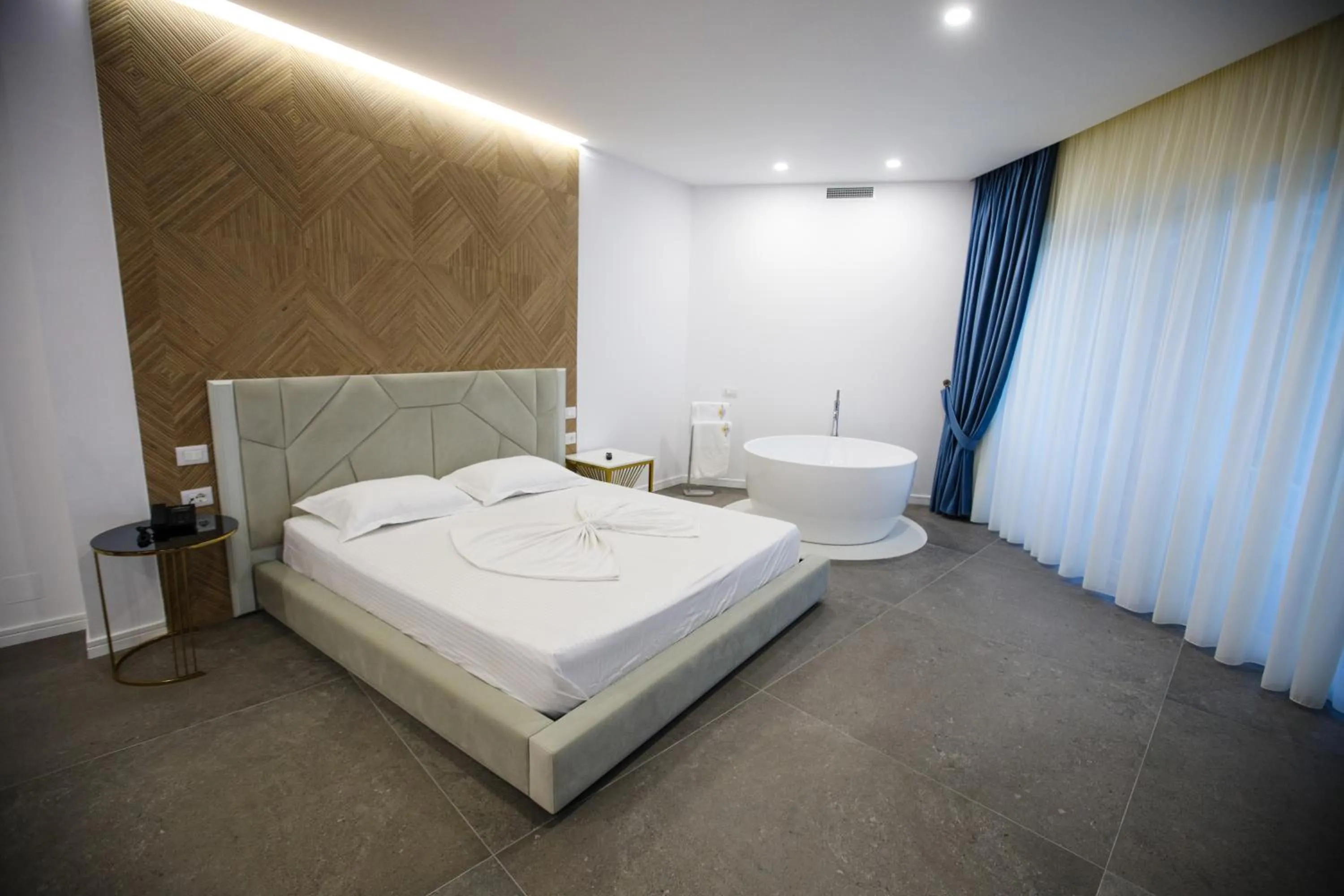 Bed in HH Boutique Hotel