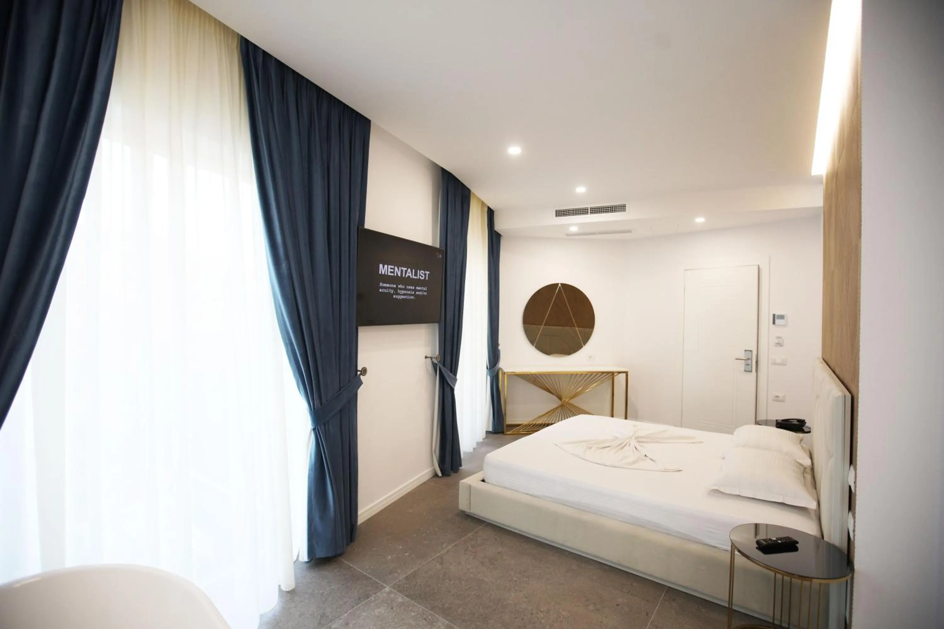 Bed in HH Boutique Hotel