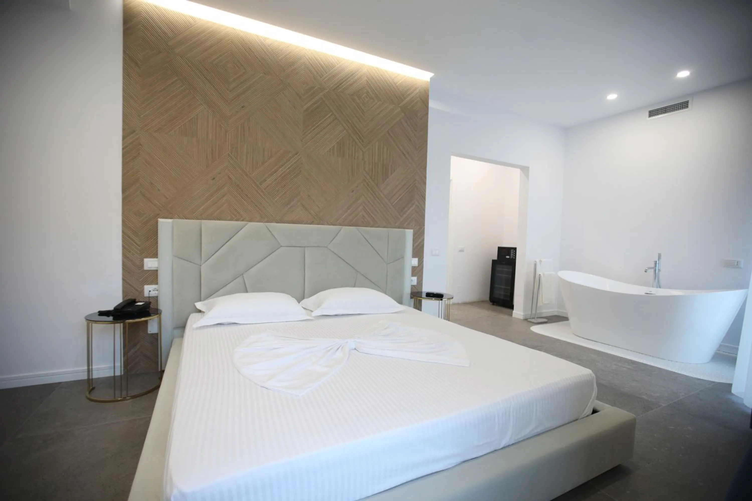 Bed in HH Boutique Hotel