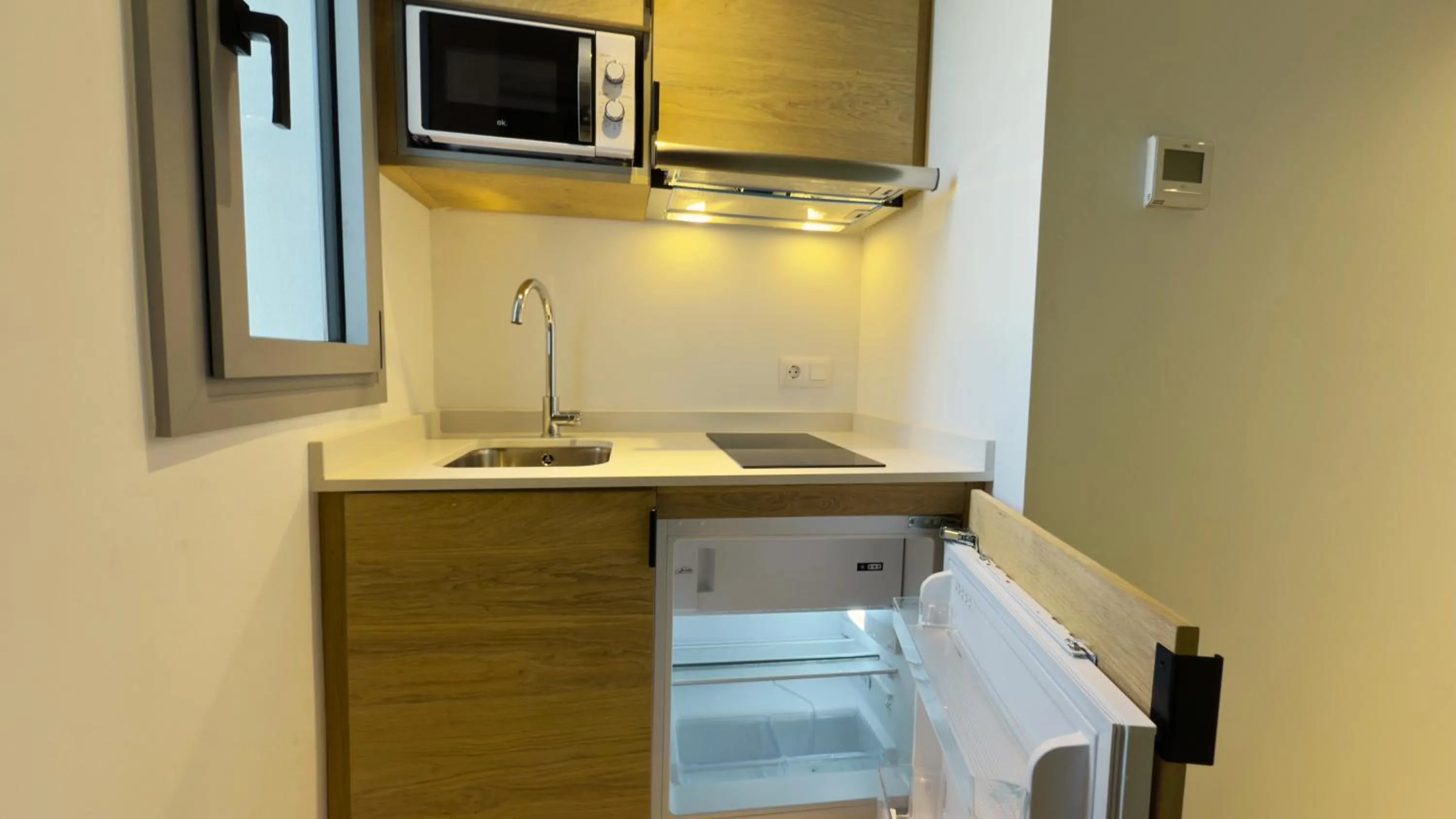 Kitchen or kitchenette in MYO Barcelona Hotel & Apartments