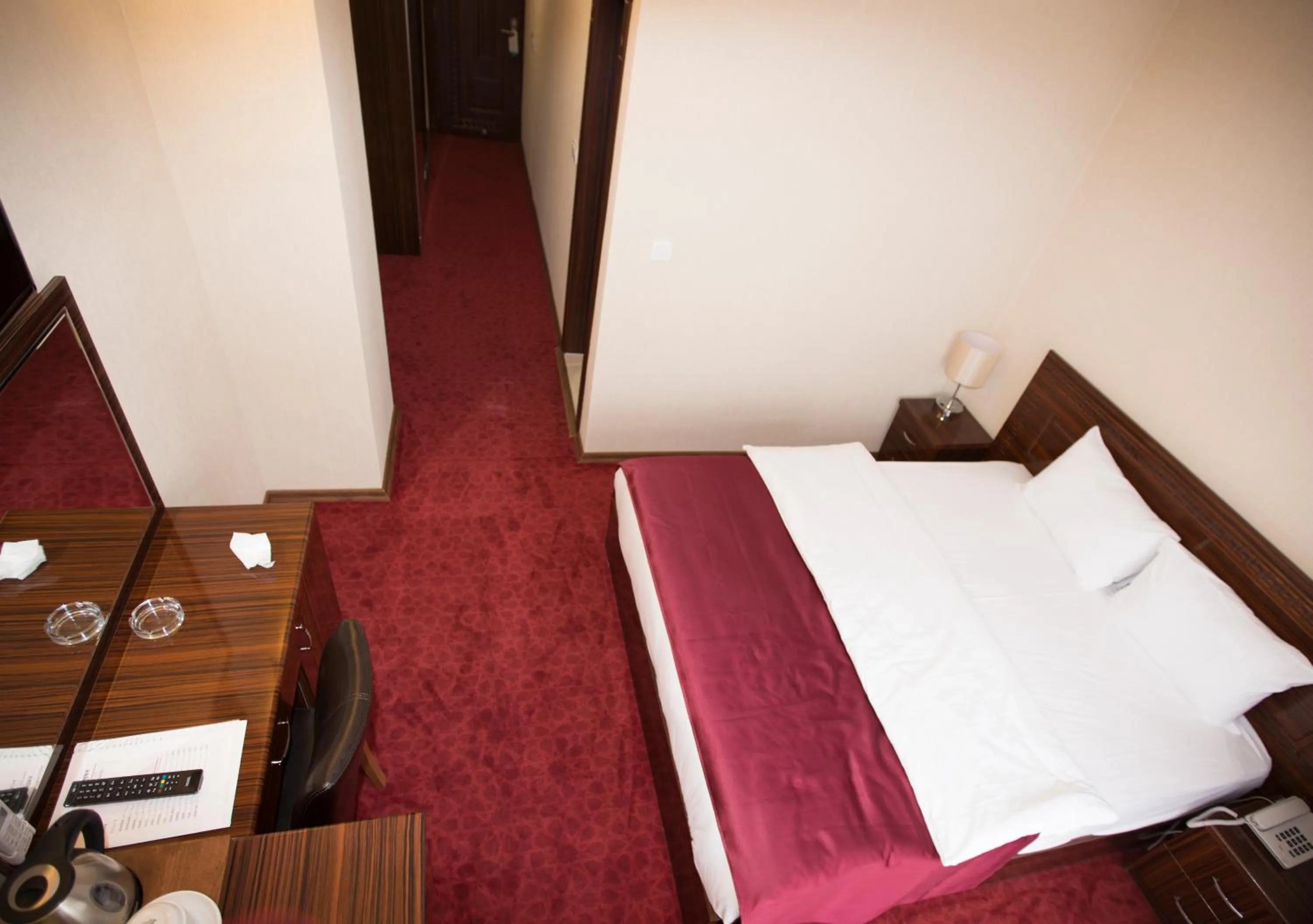 Bed in Resmina Hotel