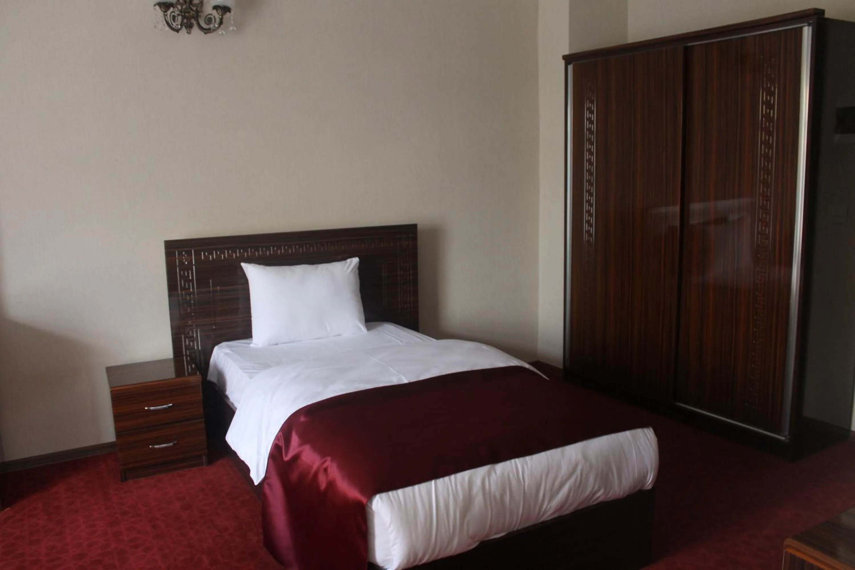 Photo of the whole room, Bed in Resmina Hotel