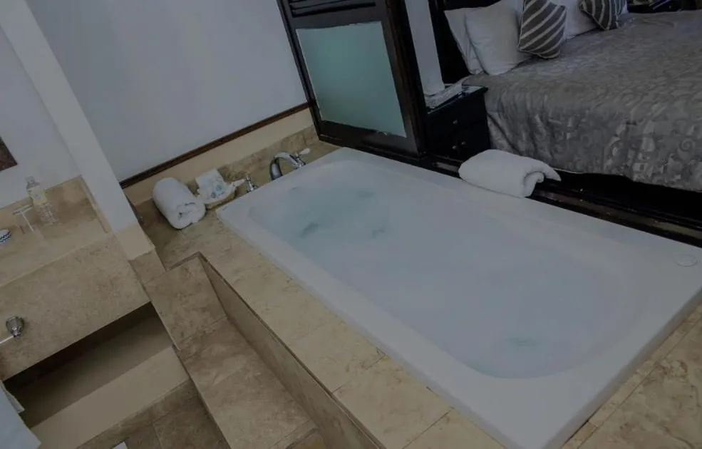 Bathroom, Bed in La Posada Hotel Boutique