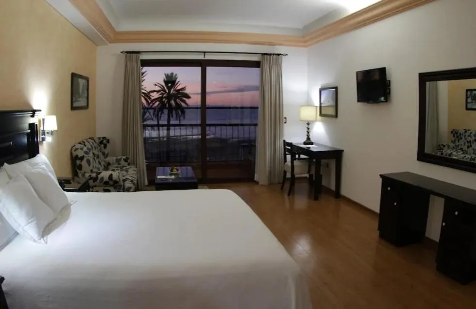 Bed in La Posada Hotel Boutique