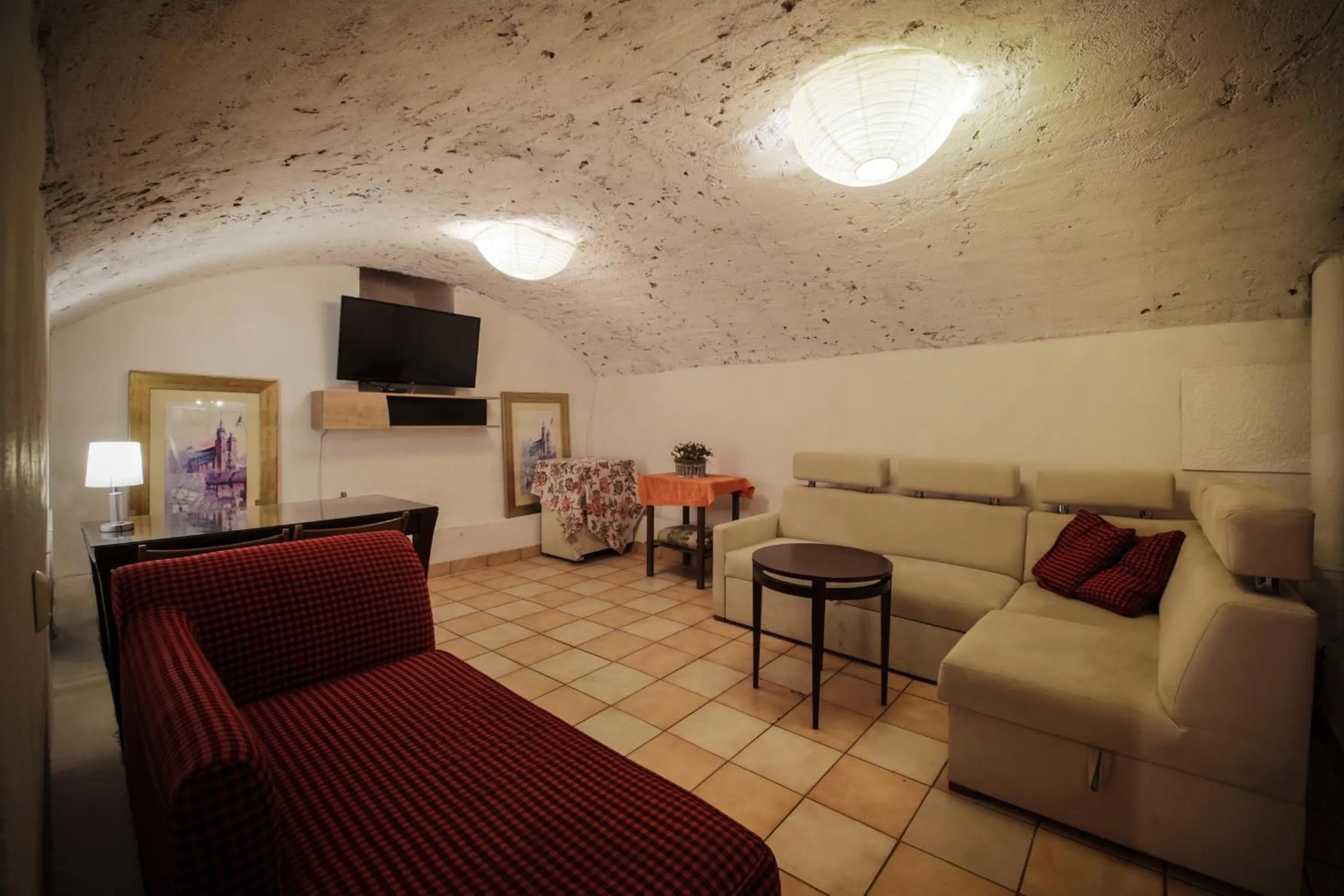 Communal lounge/ TV room in Red Carpet Hostel