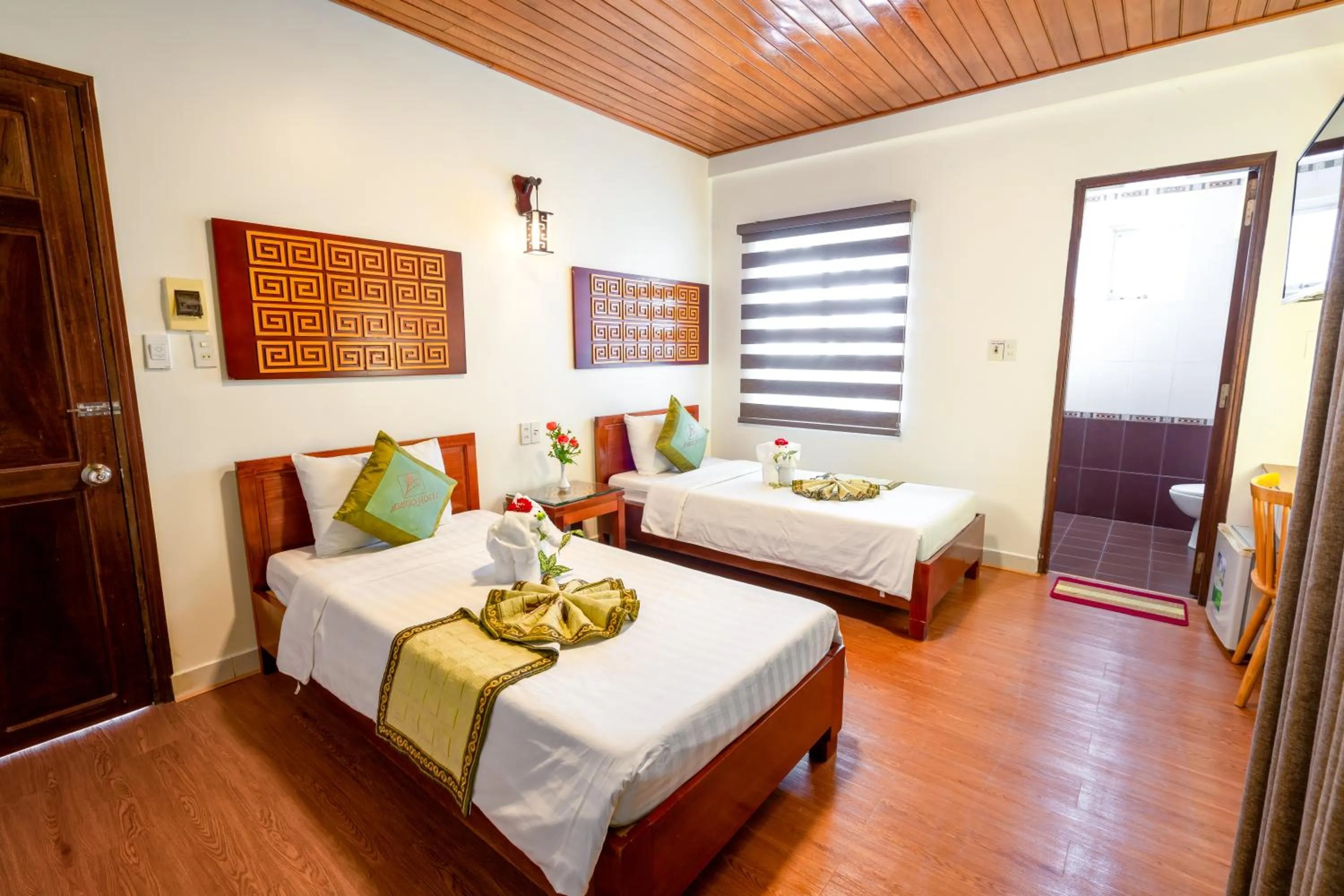 Bed in AMIGO HUE hotel