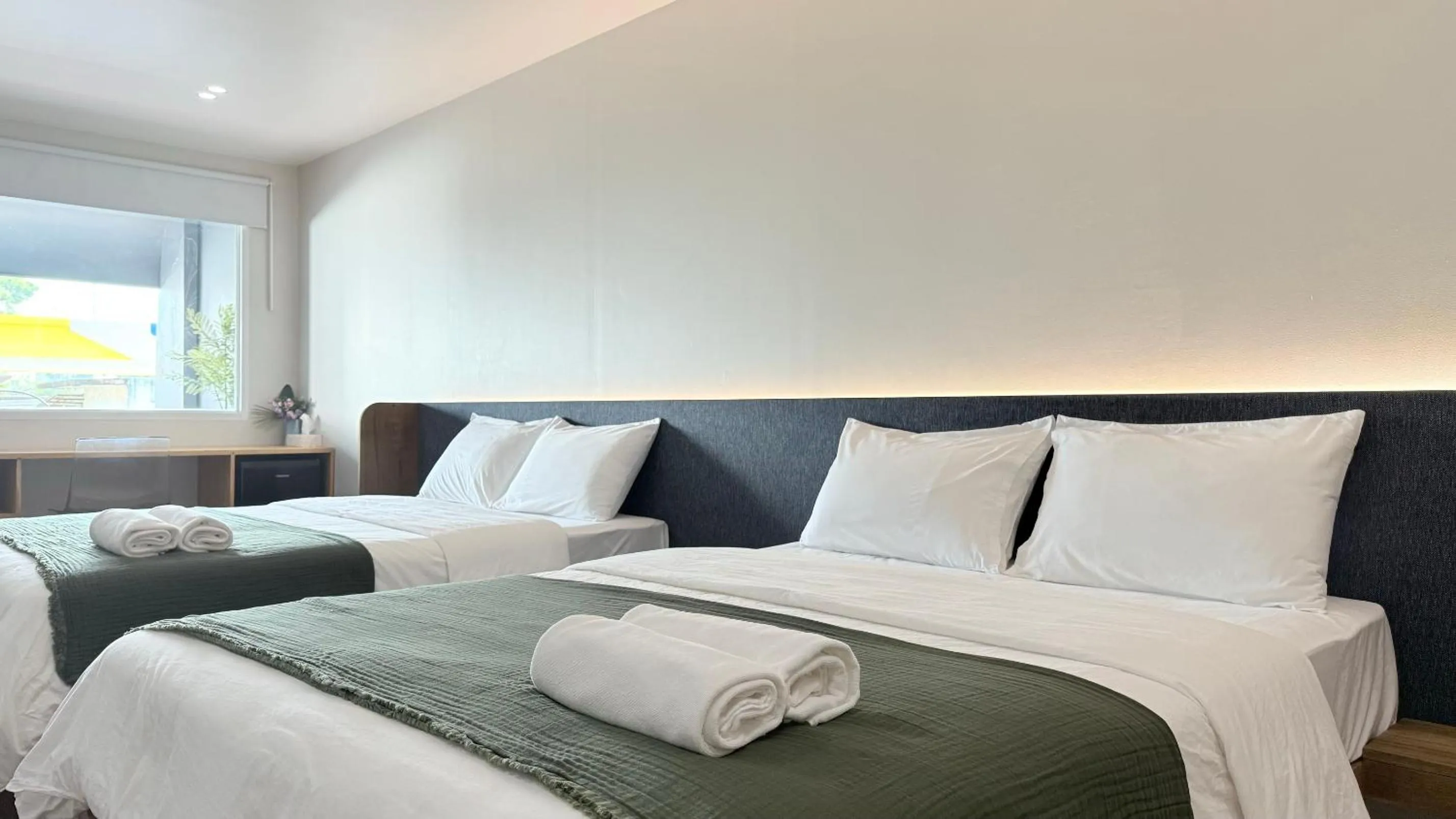 Bed in Issara House Bangkok