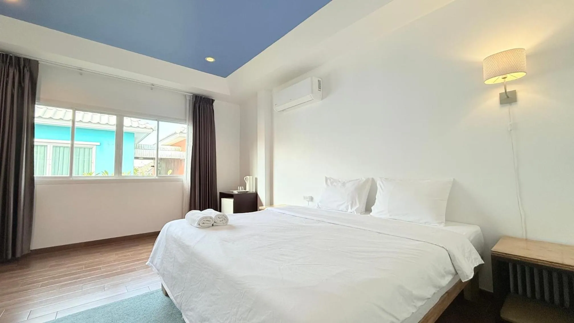 Bed in Issara House Bangkok