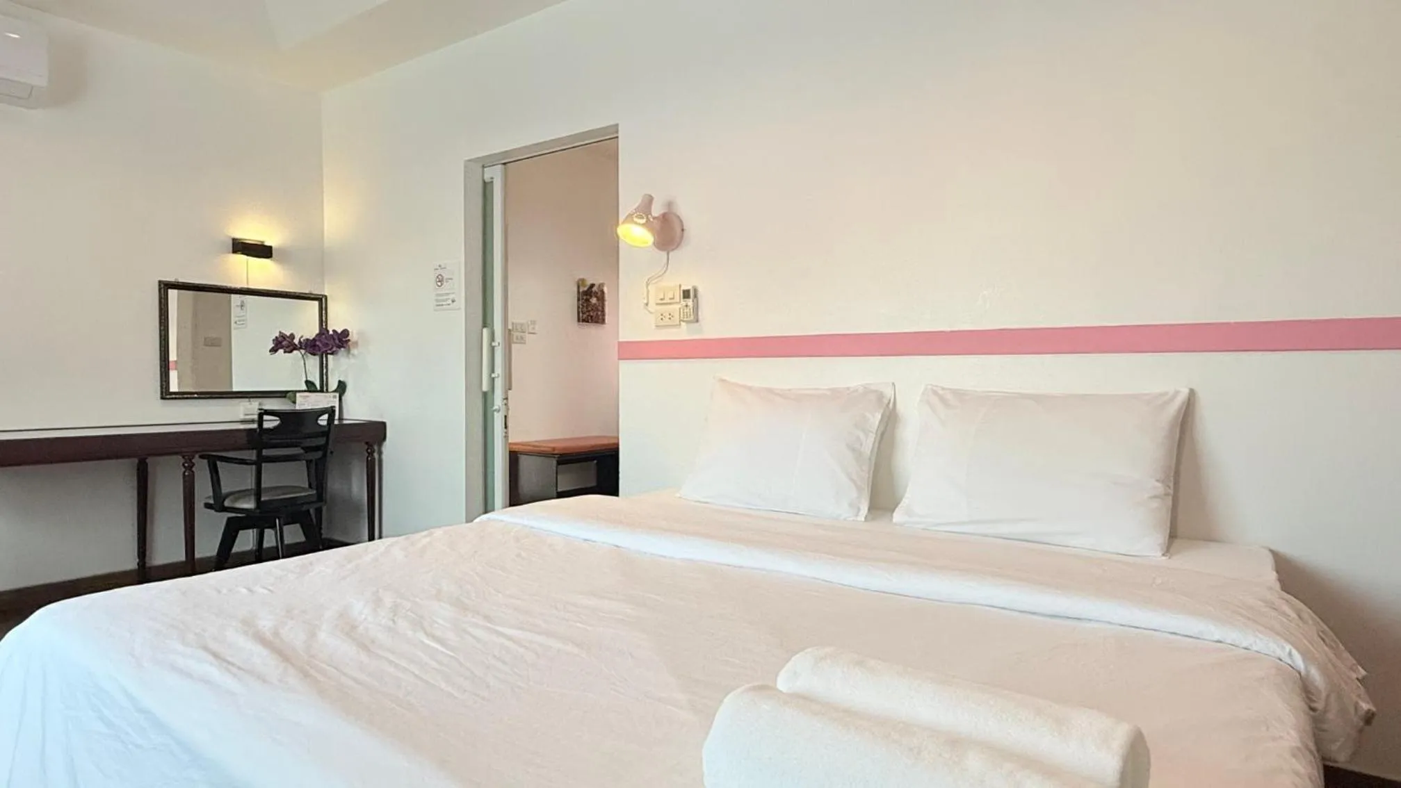 Bed in Issara House Bangkok