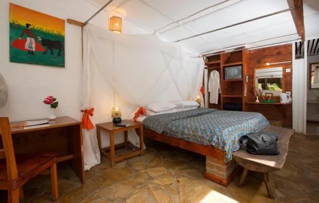 Photo of the whole room, Bed in Outpost Lodge