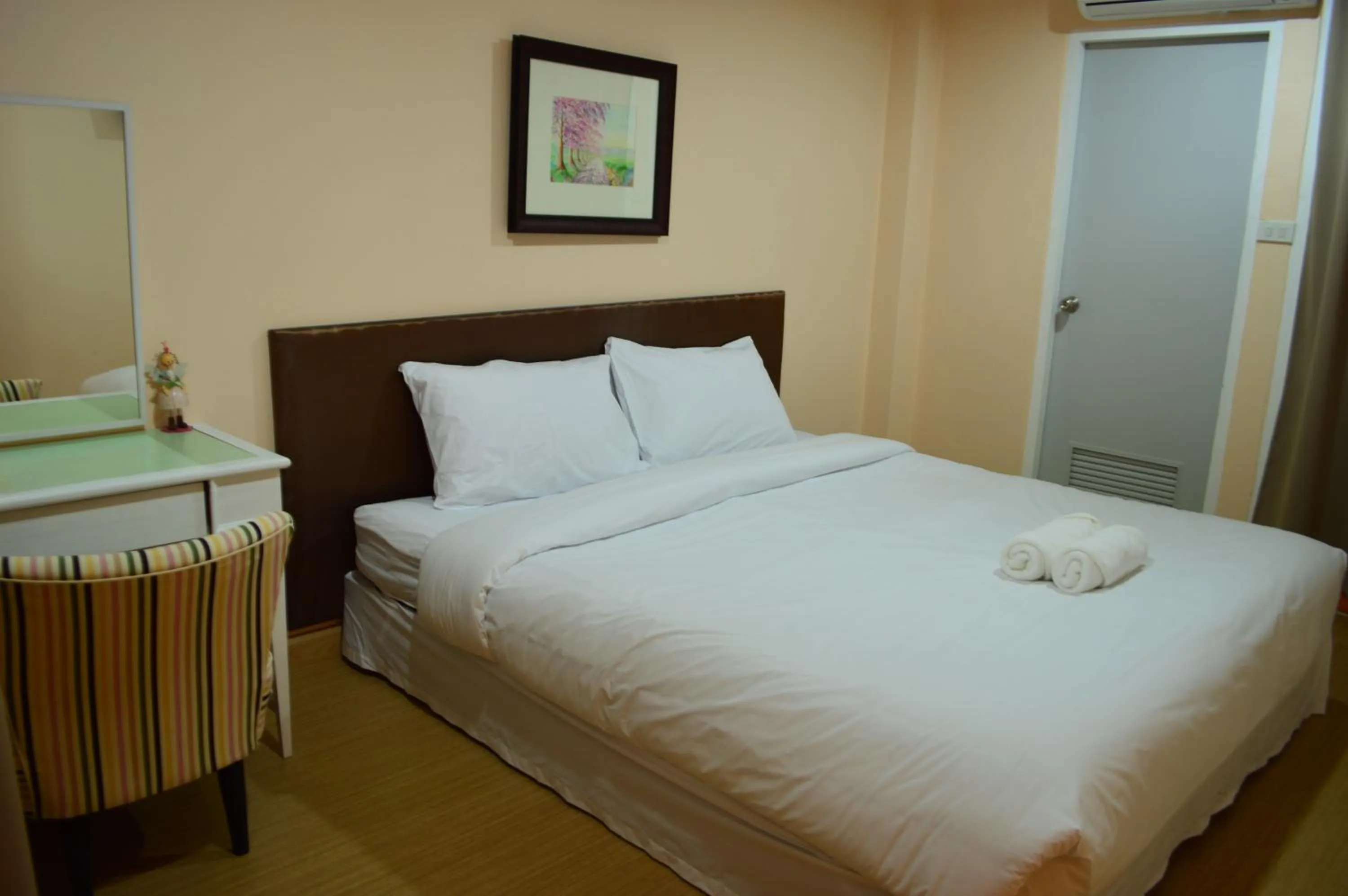 Bed in The Grace House Chiangmai