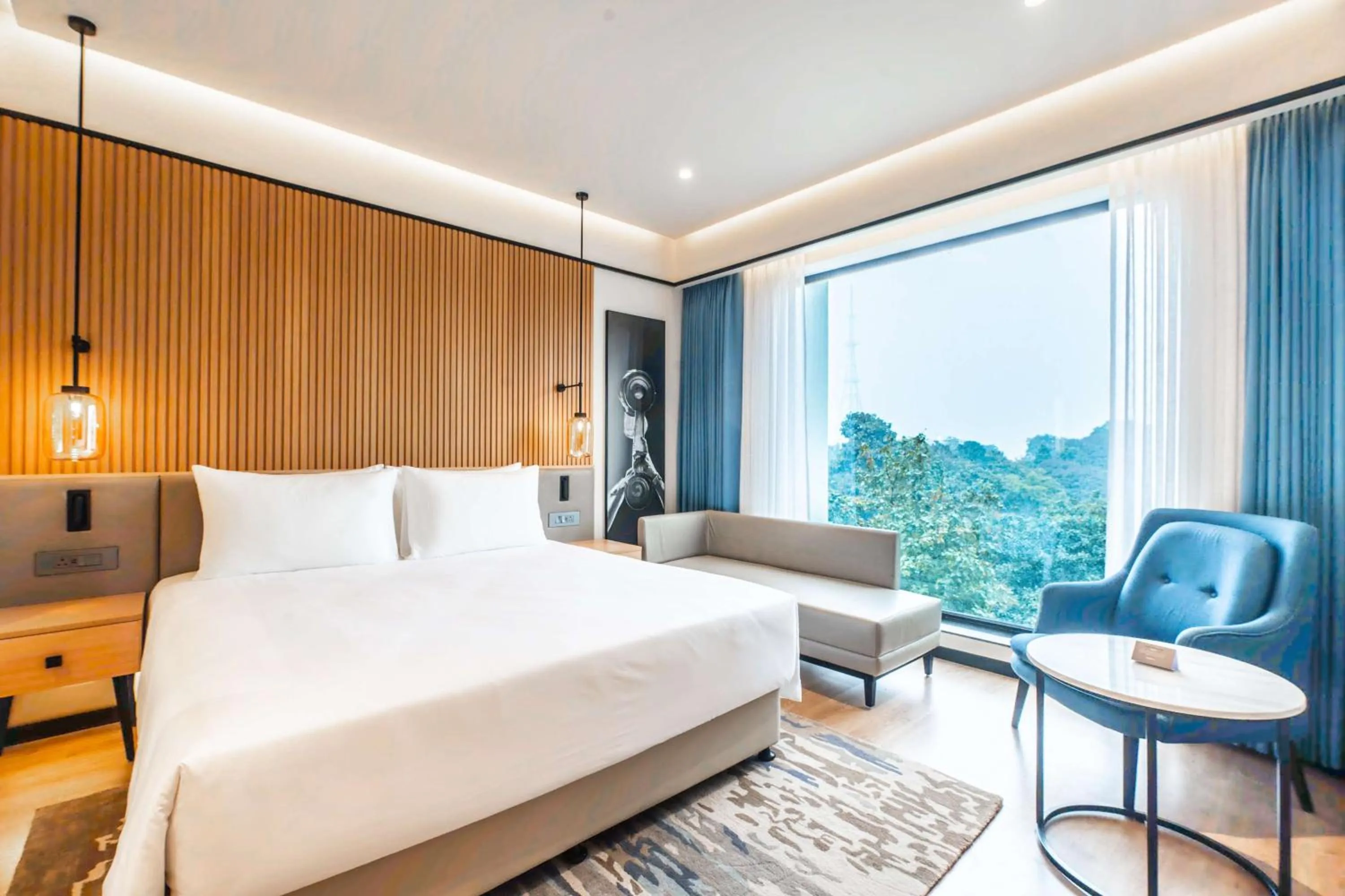 Photo of the whole room, Bed in Radisson Hotel Prayagraj