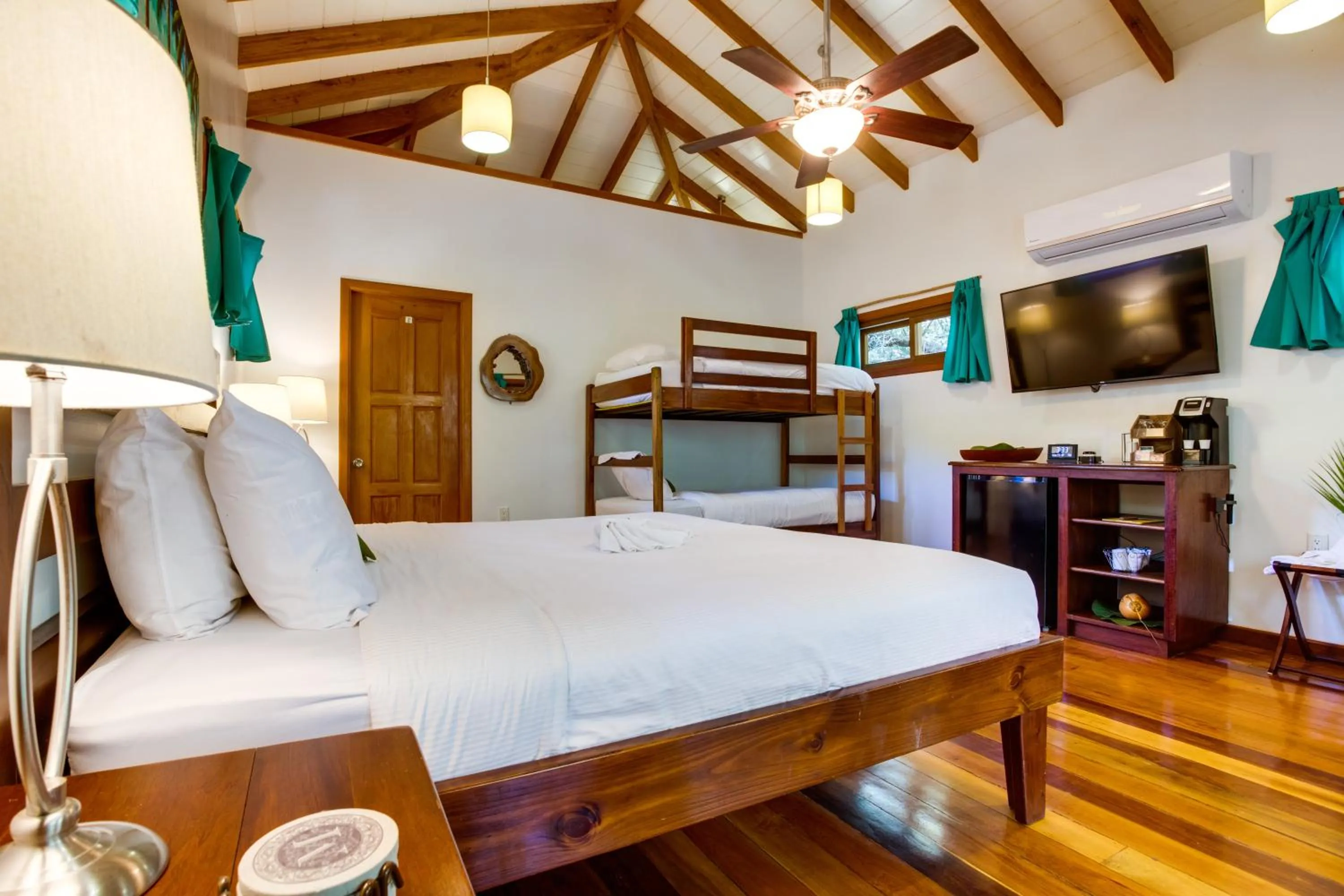 Bed in Mariposa Belize Beach Resort