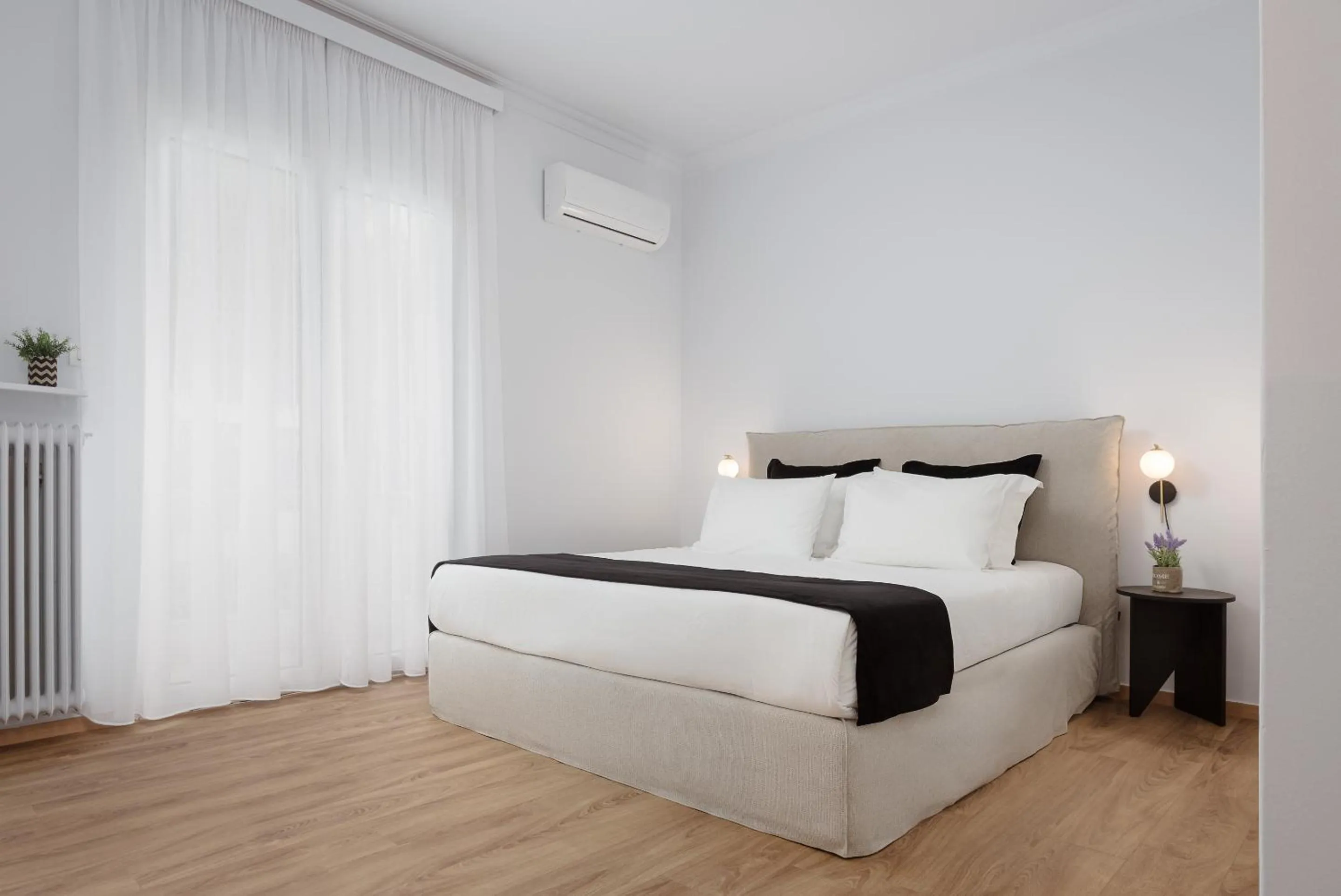 Bed in Acropolis Classy Apartments