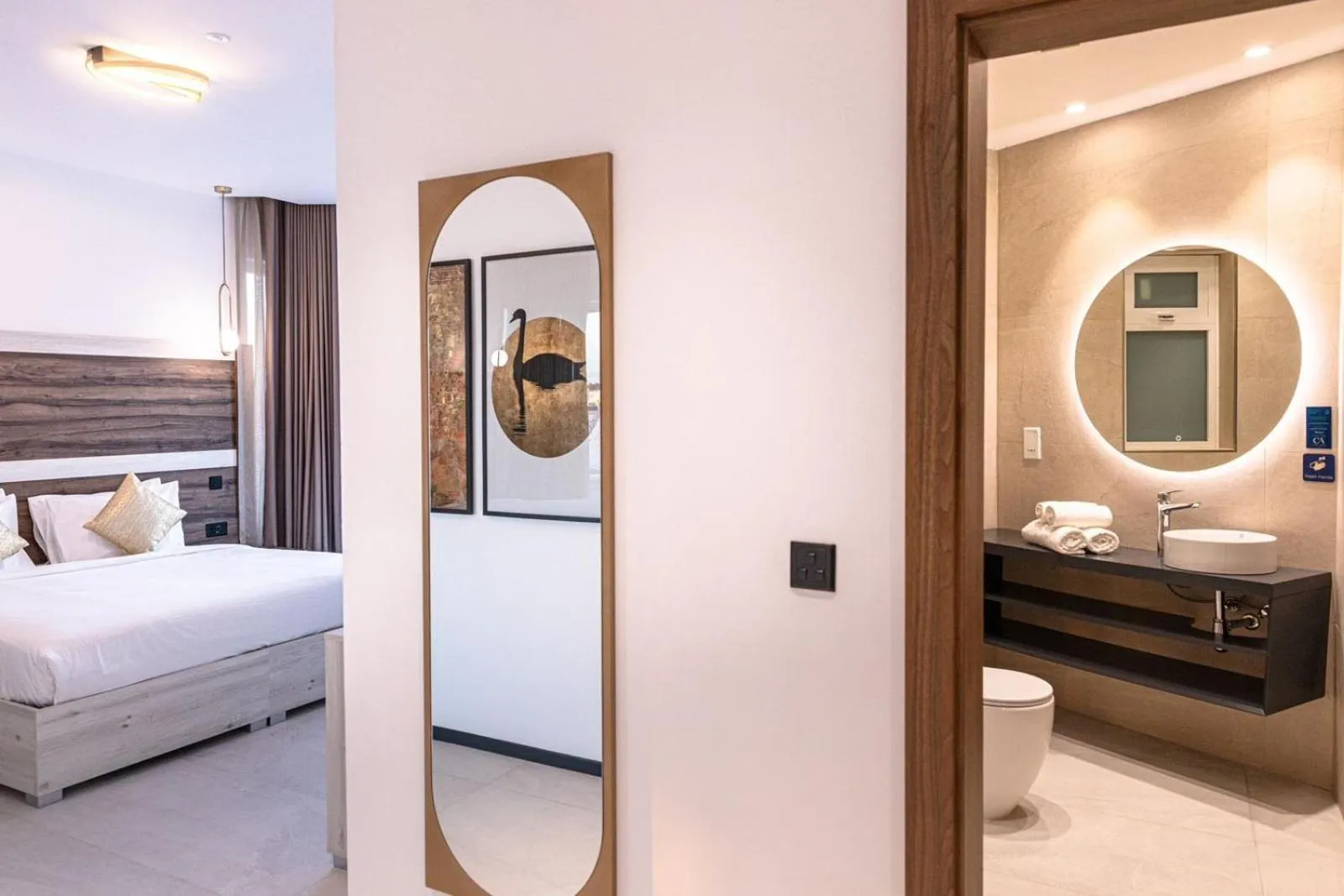 Toilet, Bed in CA Sand Dune Hotel