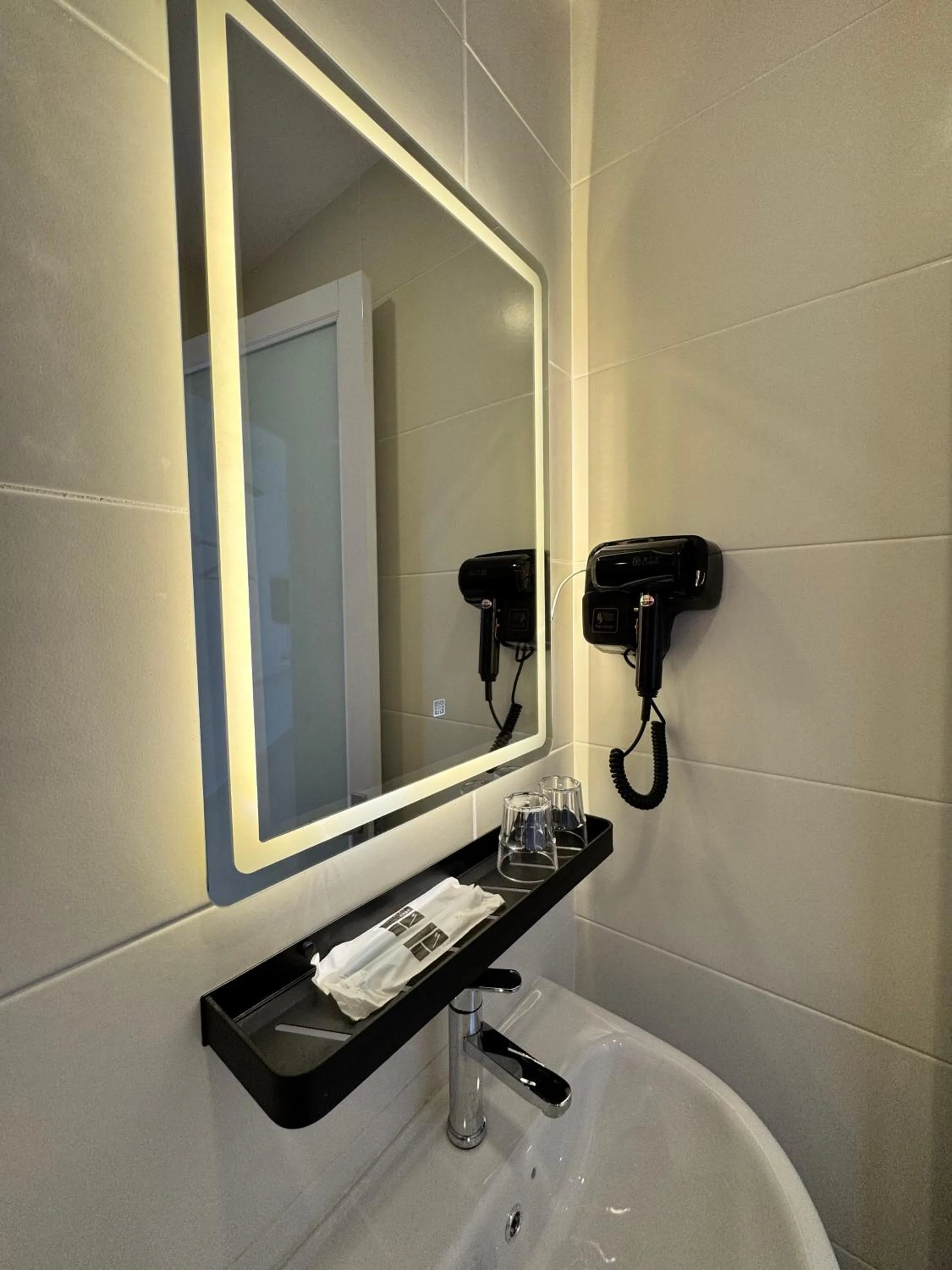 Bathroom in Maca Hotel by Sky Hive