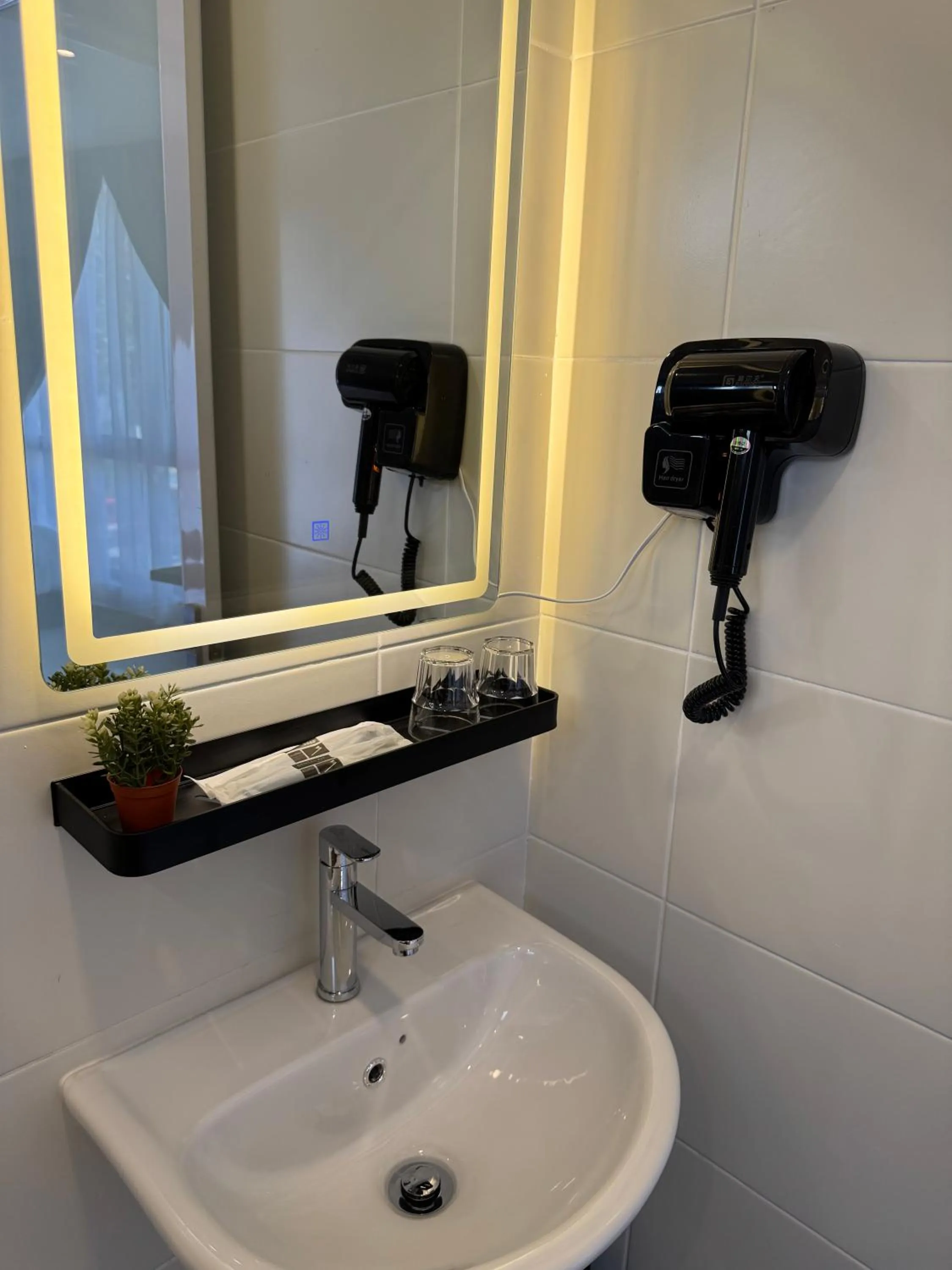 Bathroom in Maca Hotel by Sky Hive