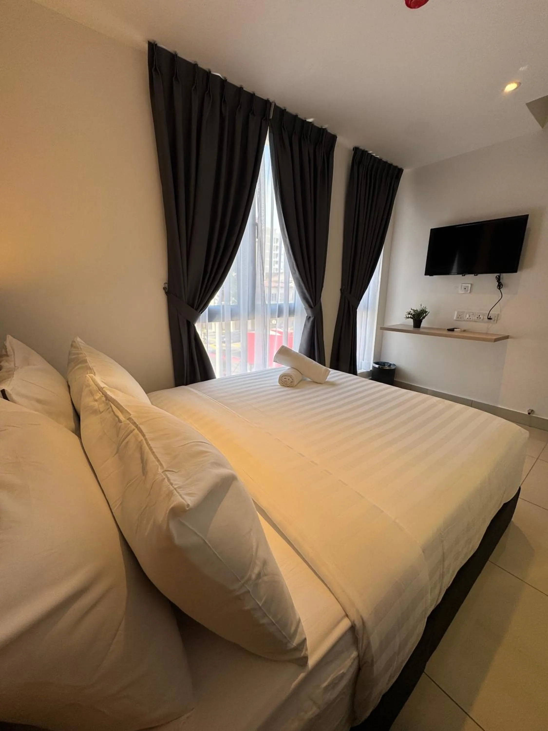 Bed in Maca Hotel by Sky Hive
