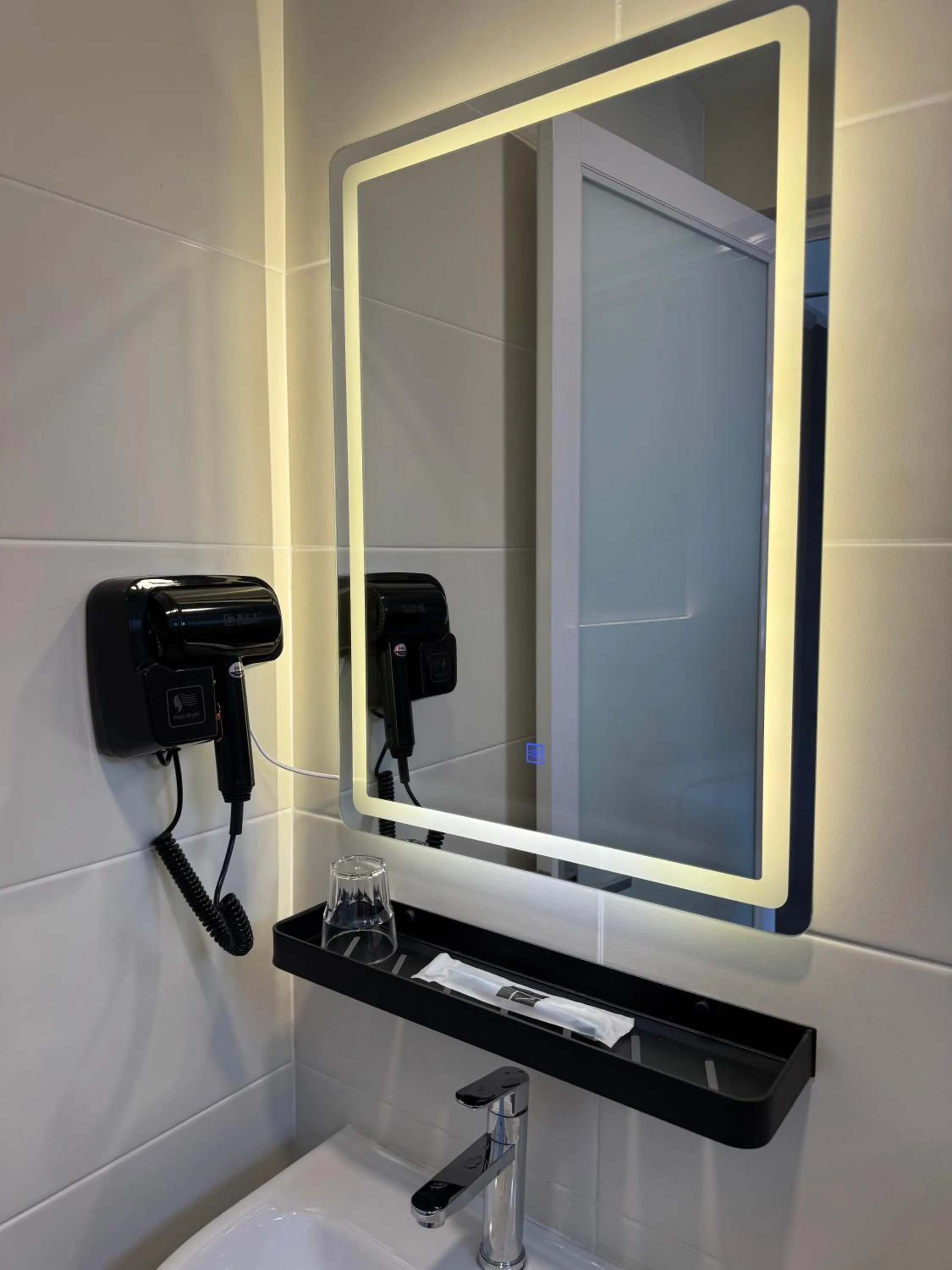 Bathroom in Maca Hotel by Sky Hive