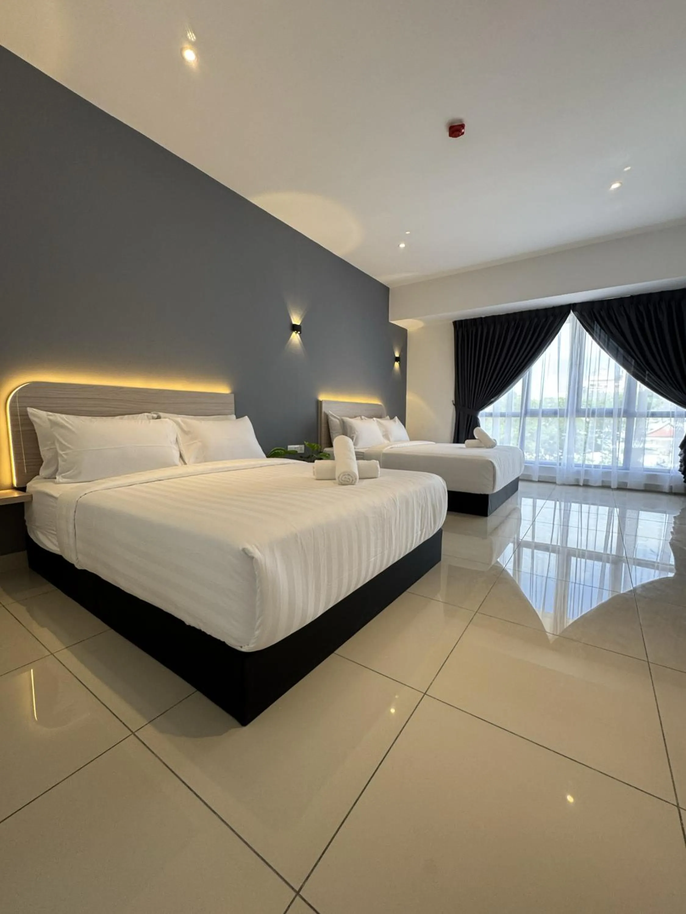 Bed in Maca Hotel by Sky Hive