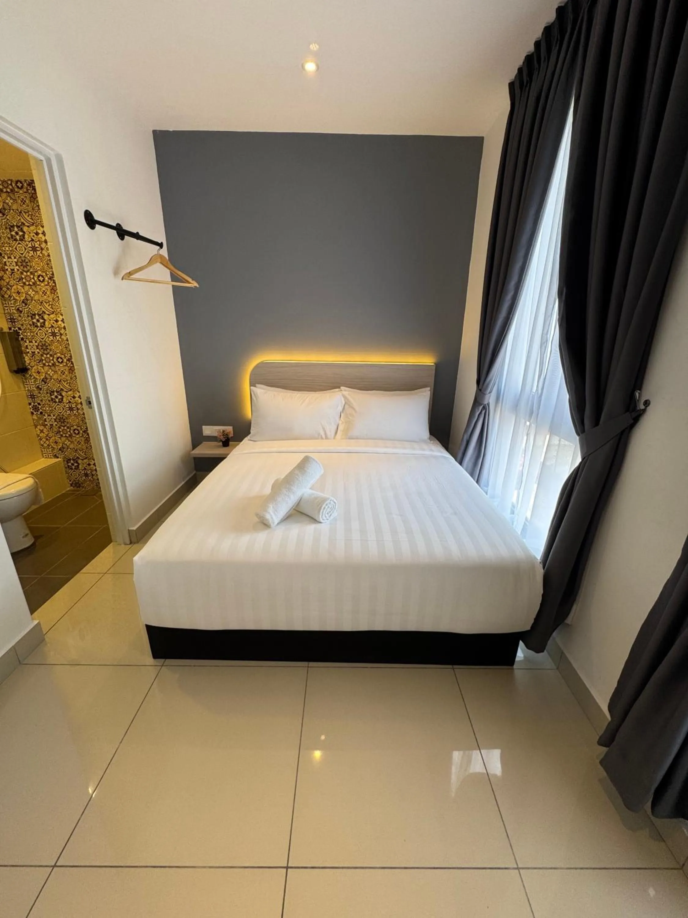 Bed in Maca Hotel by Sky Hive