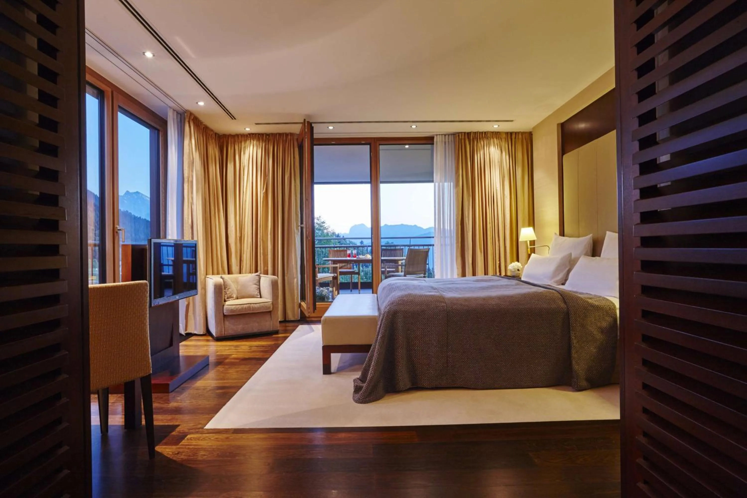 Photo of the whole room, Bed in Kempinski Hotel Berchtesgaden