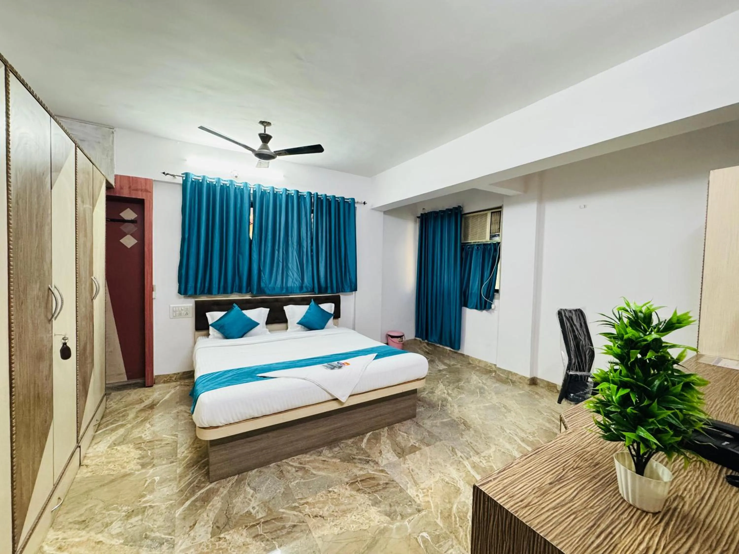 Bed in Raksha Residency