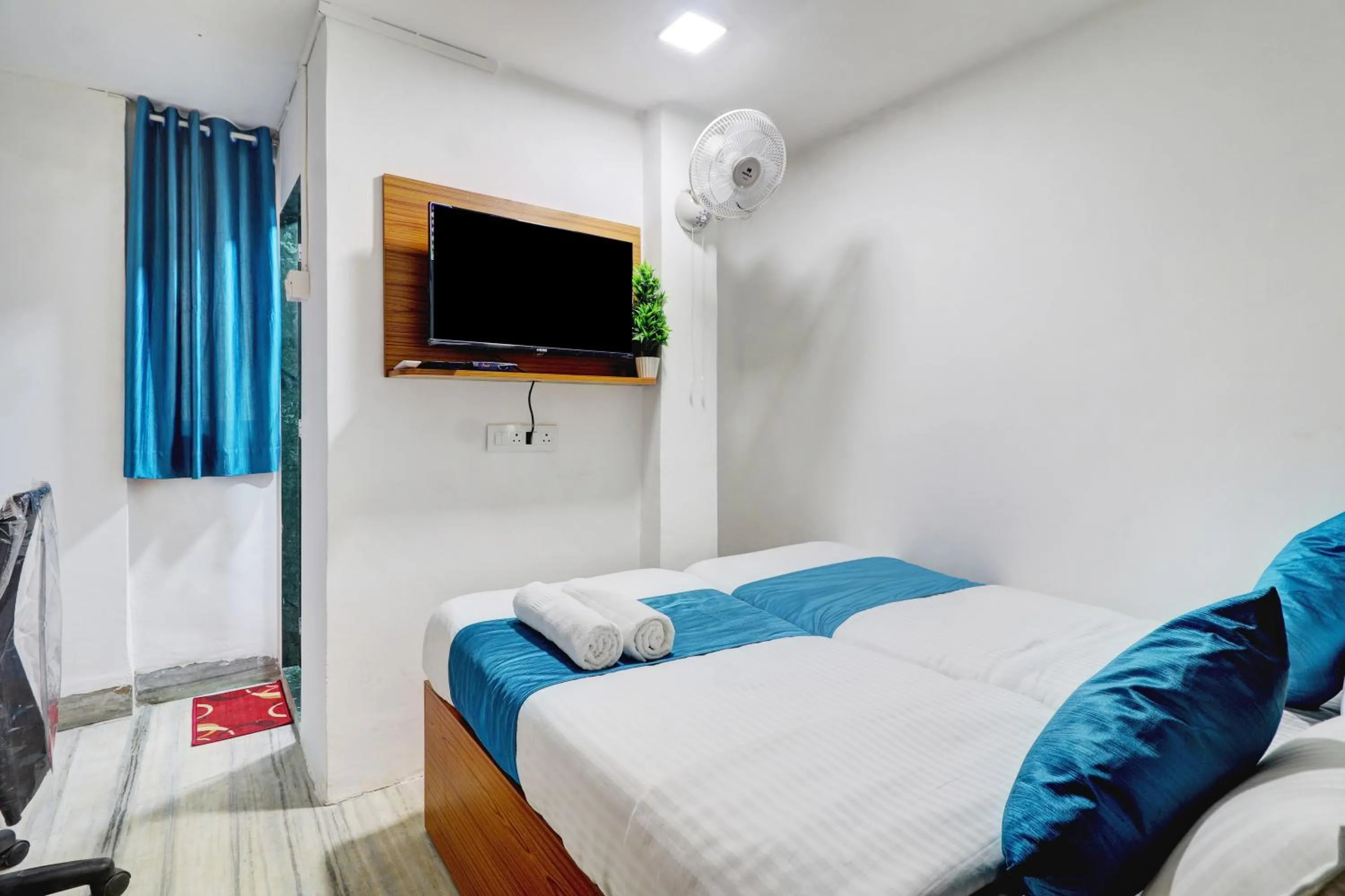 Bed in Raksha Residency