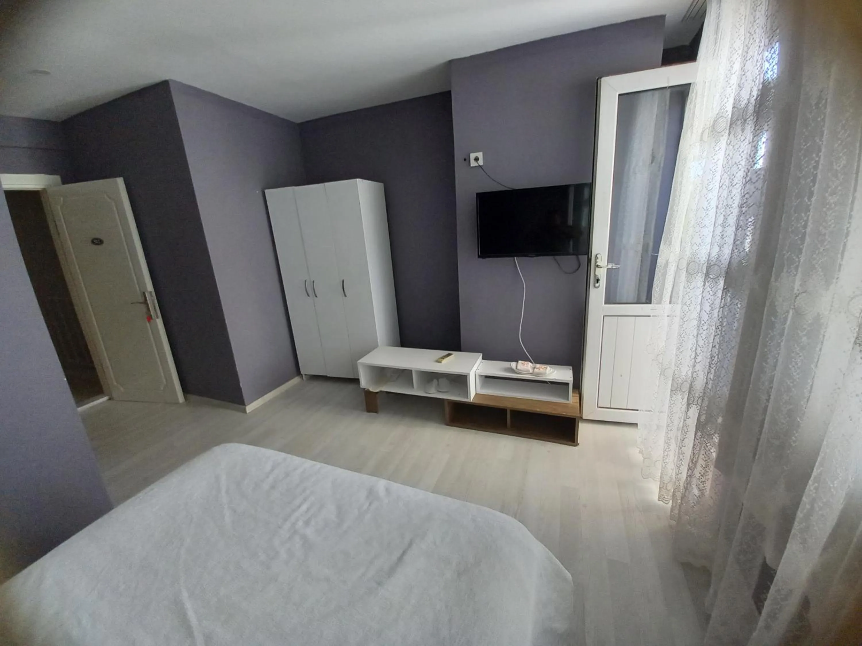 TV and multimedia, Bed in Dilmac Hotel