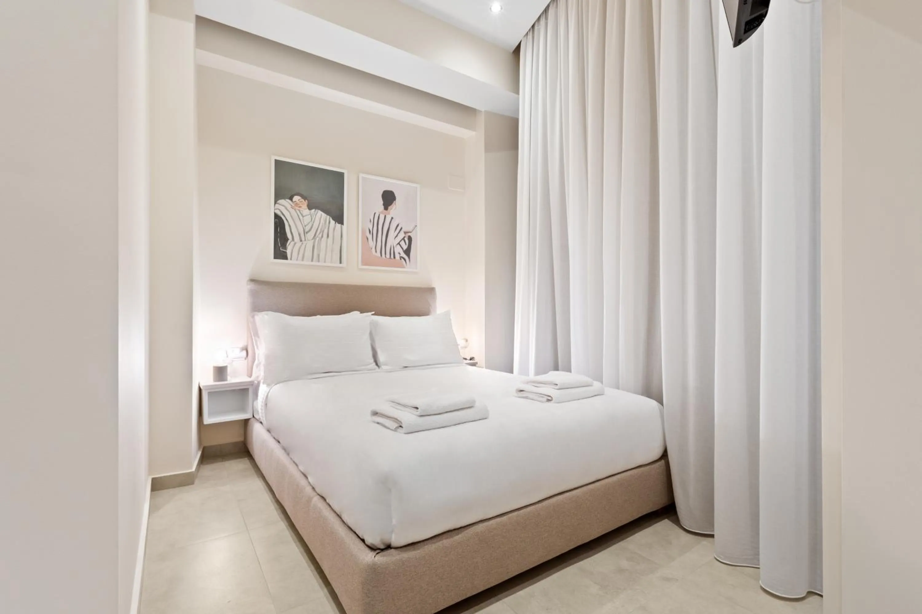 Bed in Enea City Suites