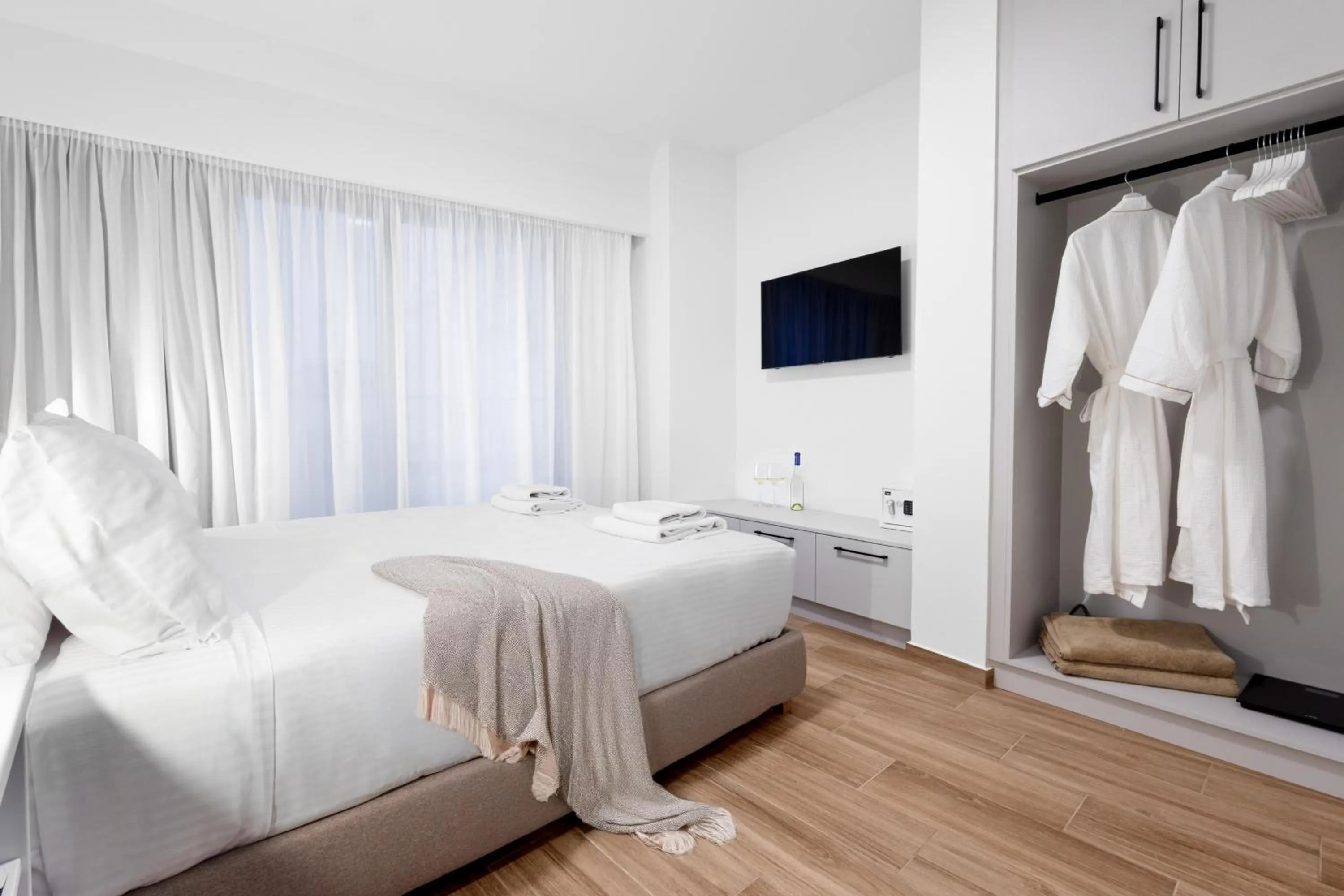 Bed in Enea City Suites