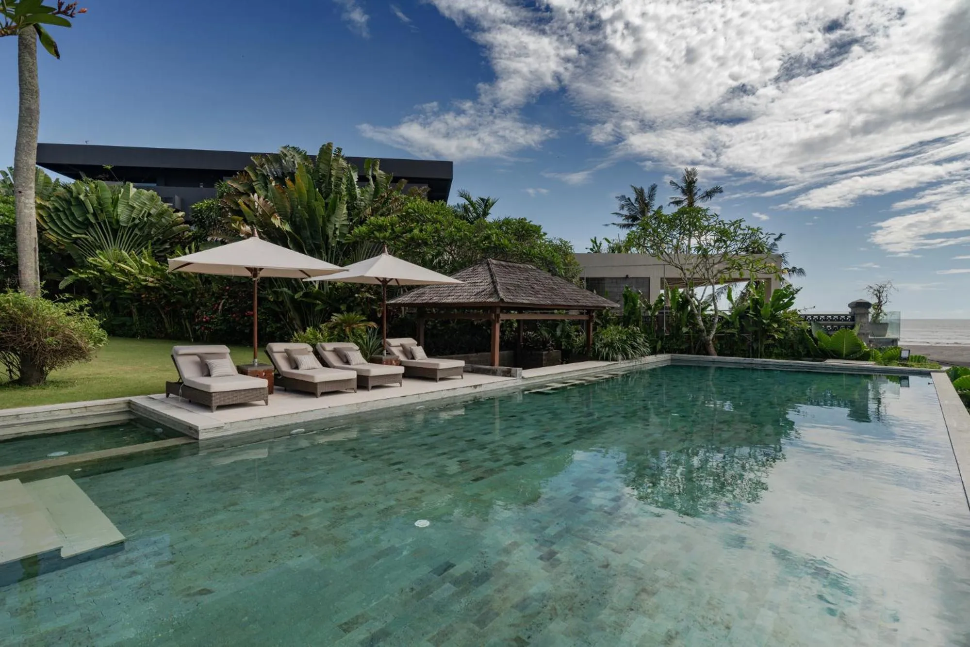 Swimming pool in OMEKAI Cemagi by Nakula