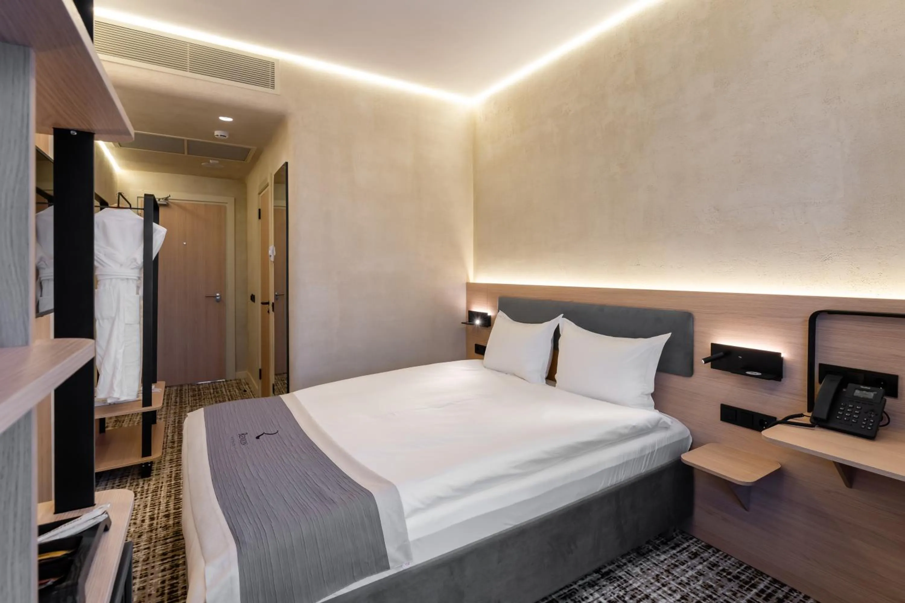 Bed in Renion City Hotel