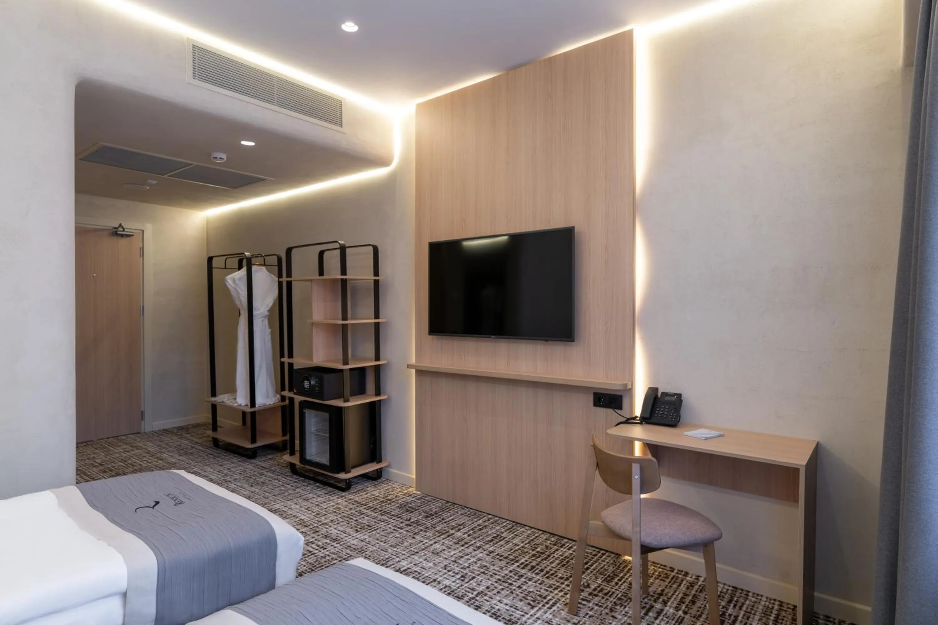 TV and multimedia, Bed in Renion City Hotel