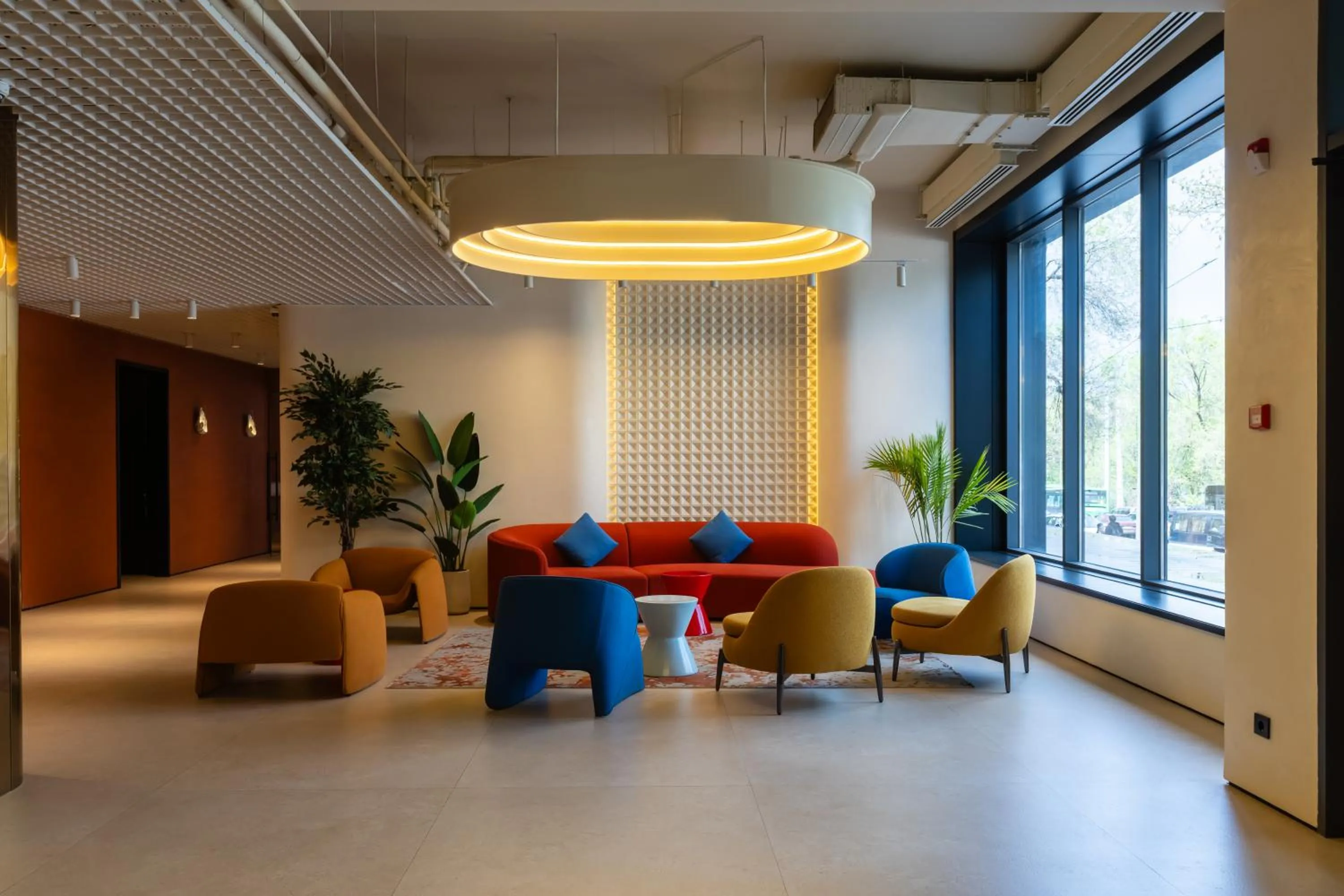 Communal lounge/ TV room in Renion City Hotel