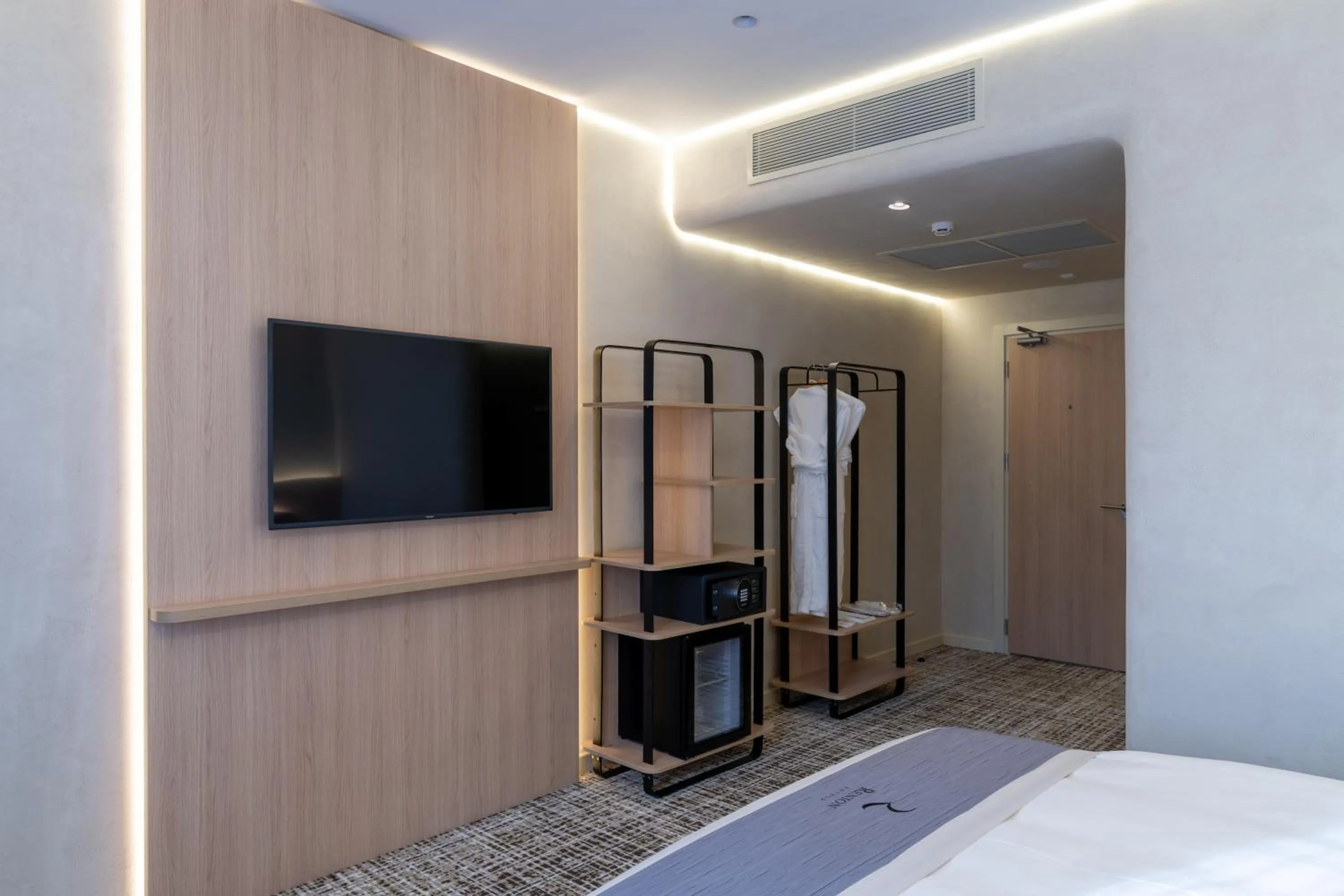 TV and multimedia, Bed in Renion City Hotel