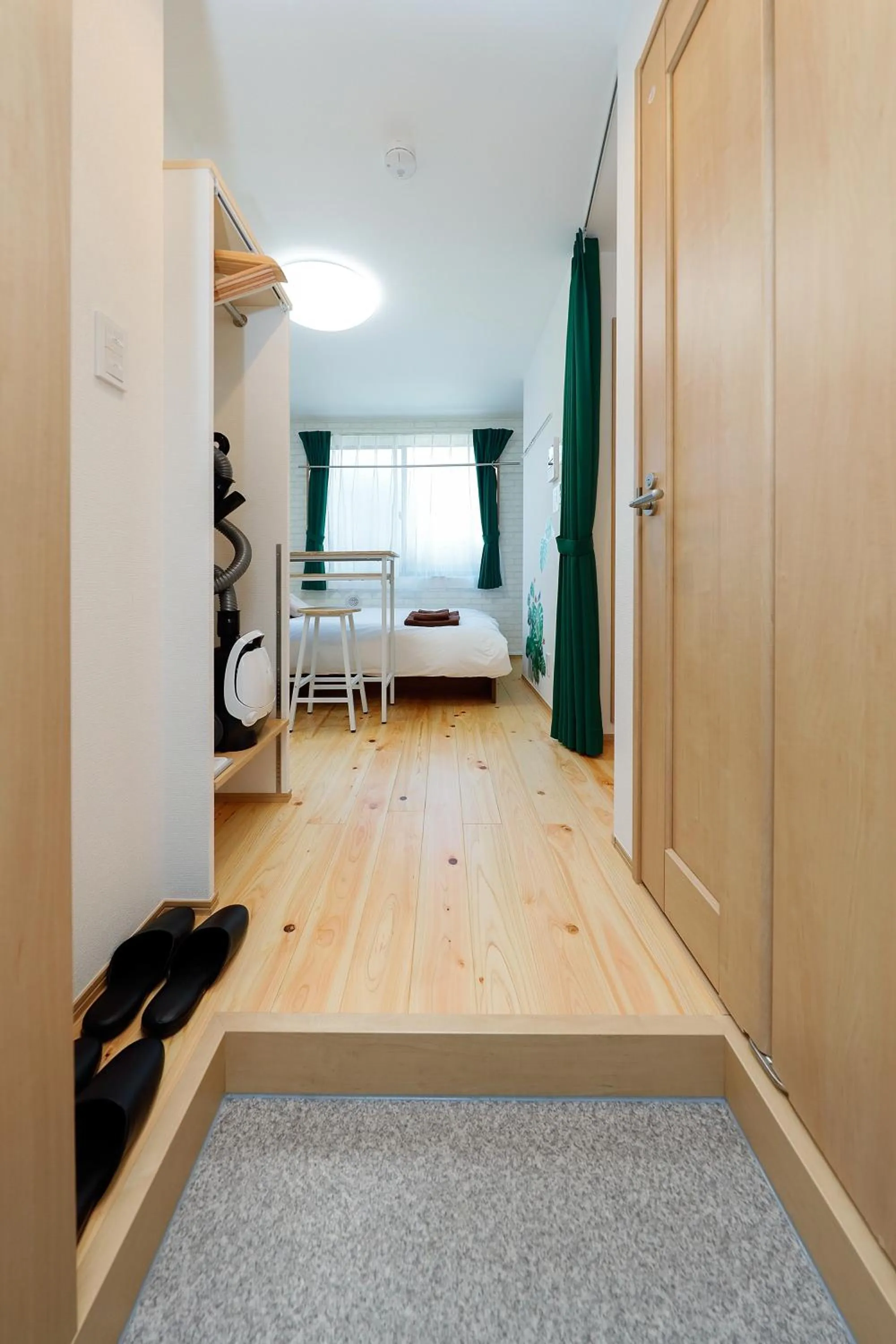 Bed in Zenith Shinjuku Hinoki by Tranova