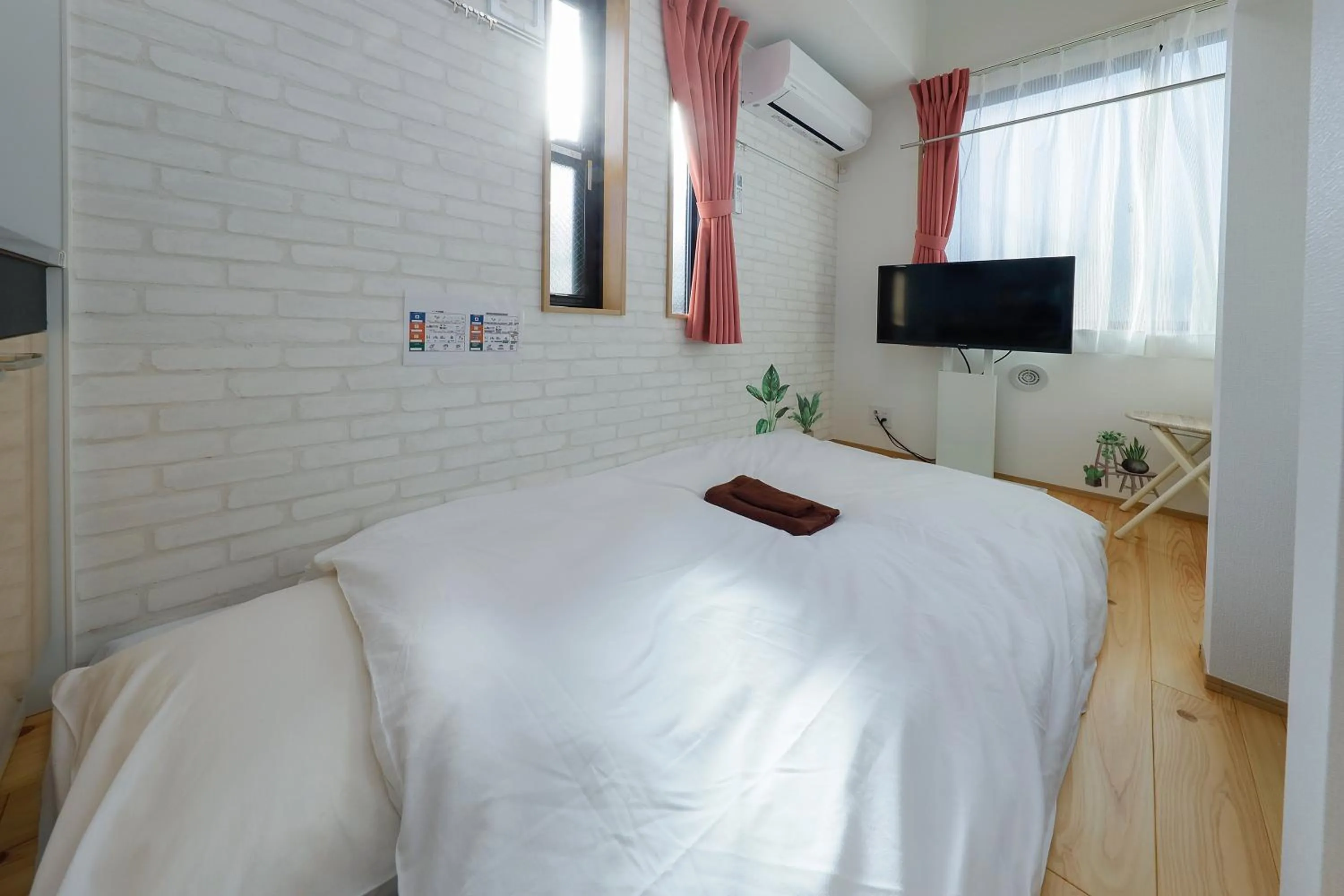 Bed in Zenith Shinjuku Hinoki by Tranova