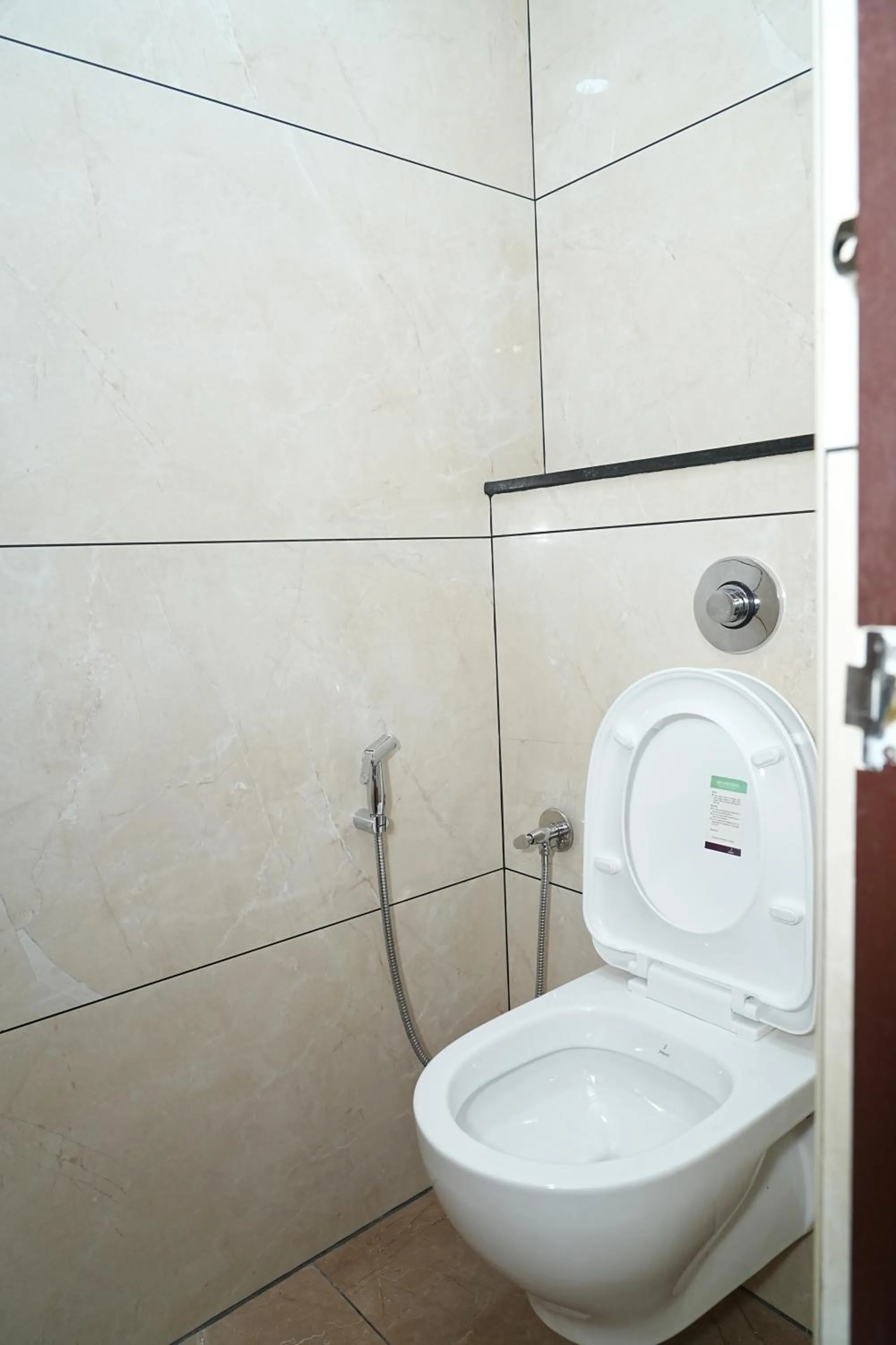 Shower in Hotel Kalyan Suites