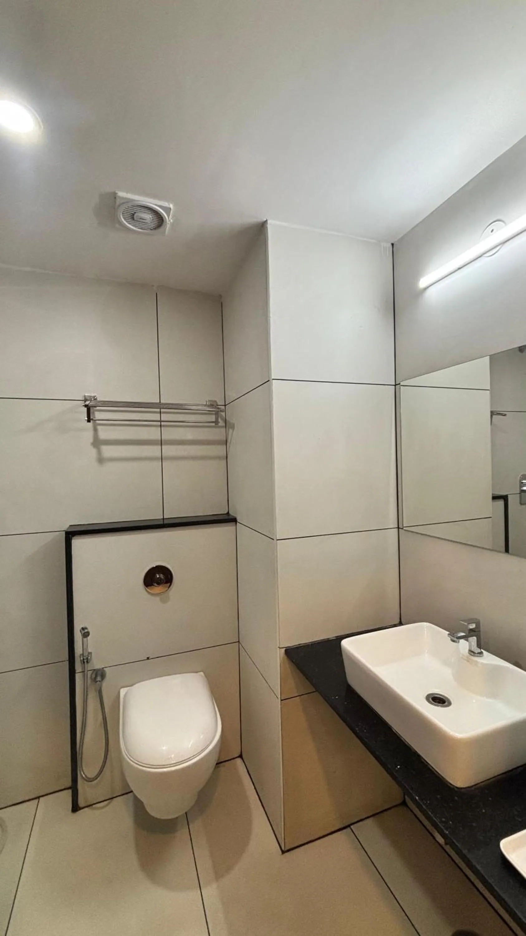 Shower in Hotel Kalyan Suites