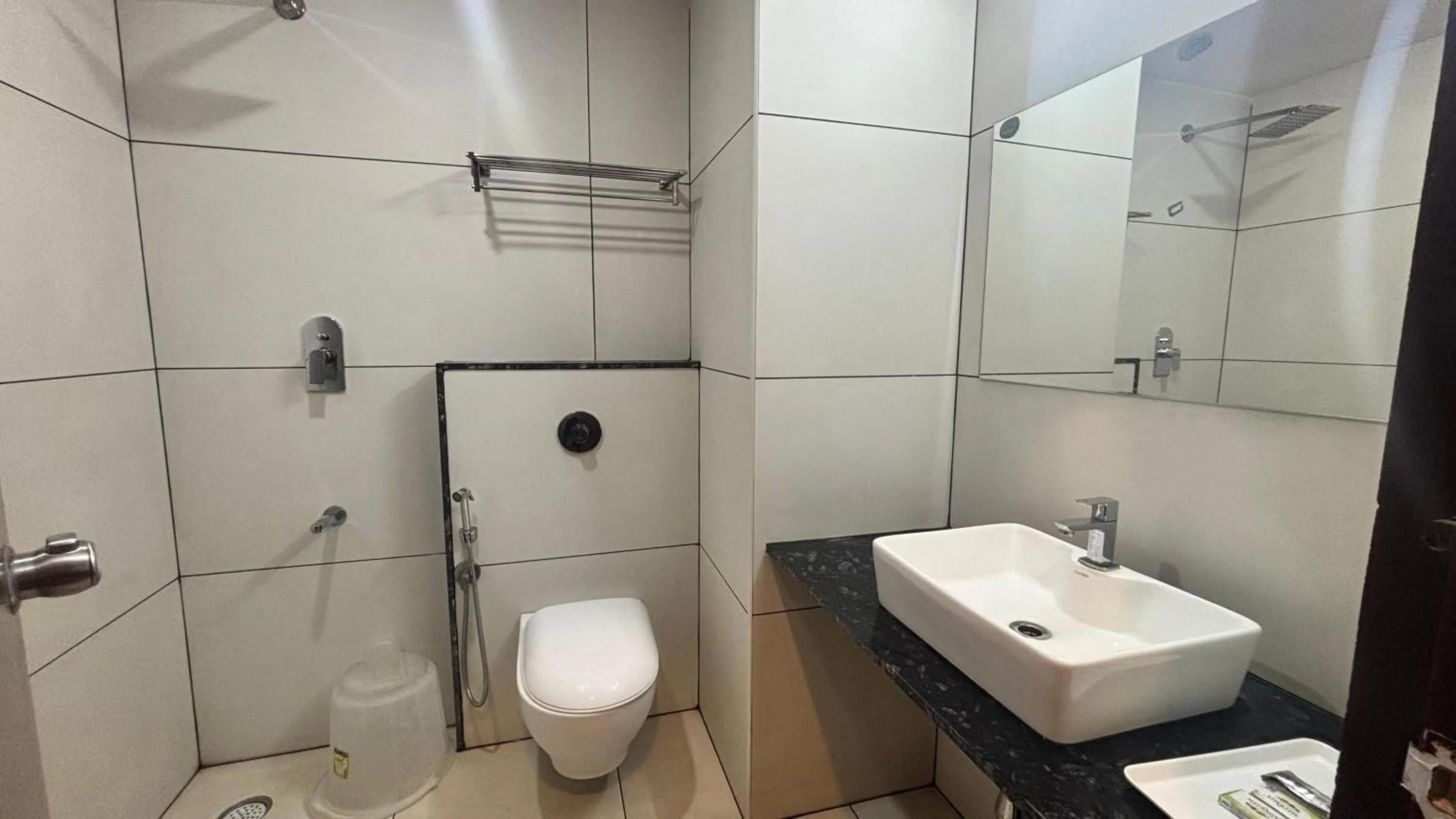 Shower in Hotel Kalyan Suites